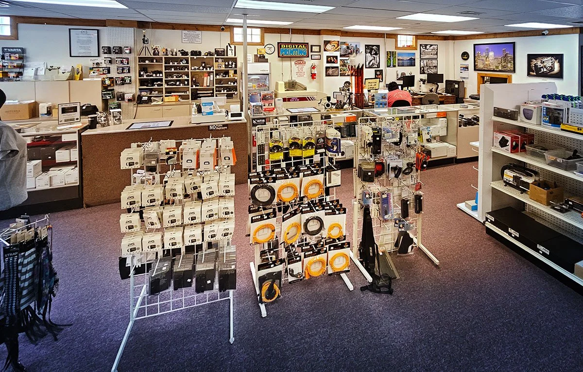 Humble Camera store interior with gear on the shelves