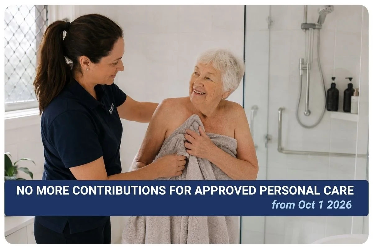 elderly woman receives assistance from female support worker to shower, personal care services contributions