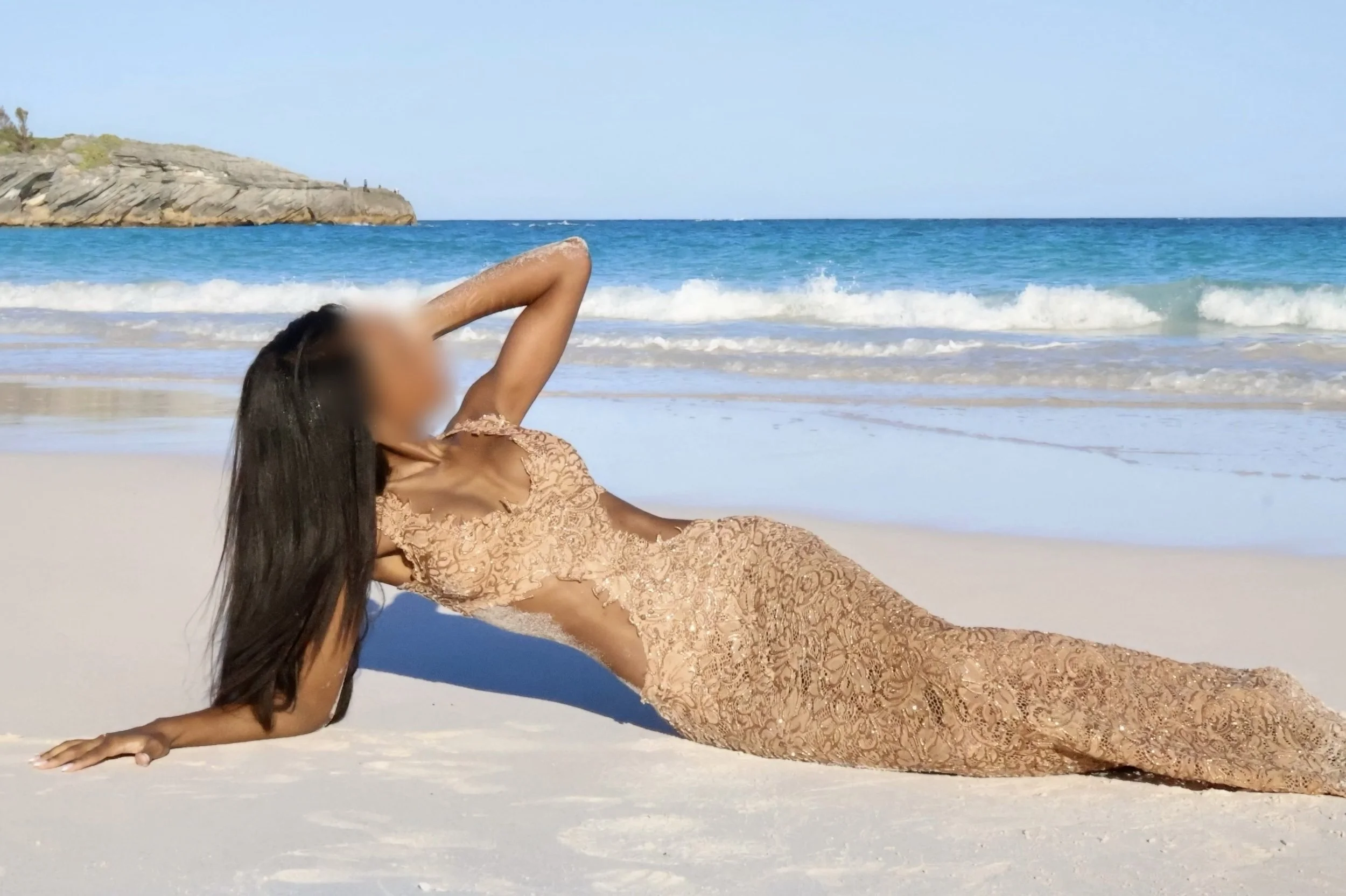 nikita-hart-beach-laying3.jpeg