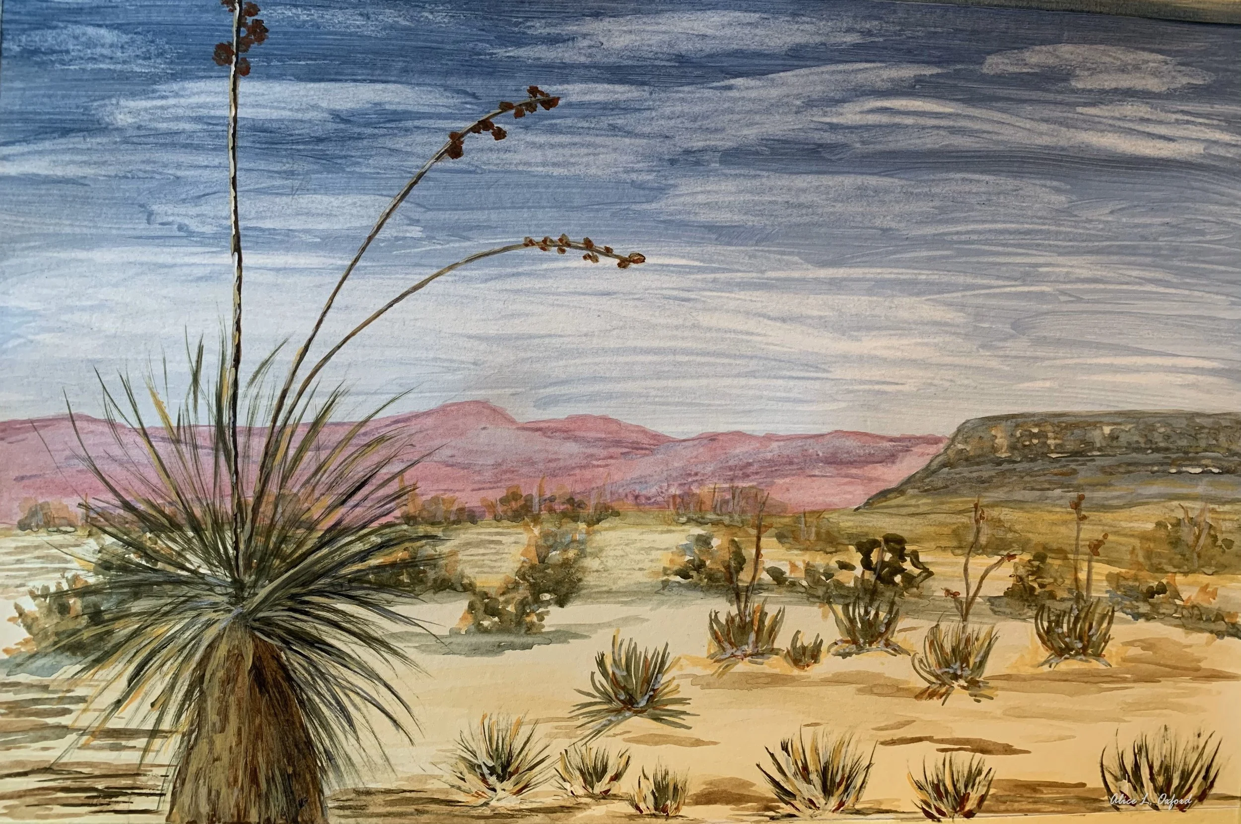 Alice Oxford's desert landscape painting featuring a prominent yucca plant in the foreground with tall flowering stalks. The background includes sparse desert vegetation, distant pinkish mountains, and a cloudy blue sky.
