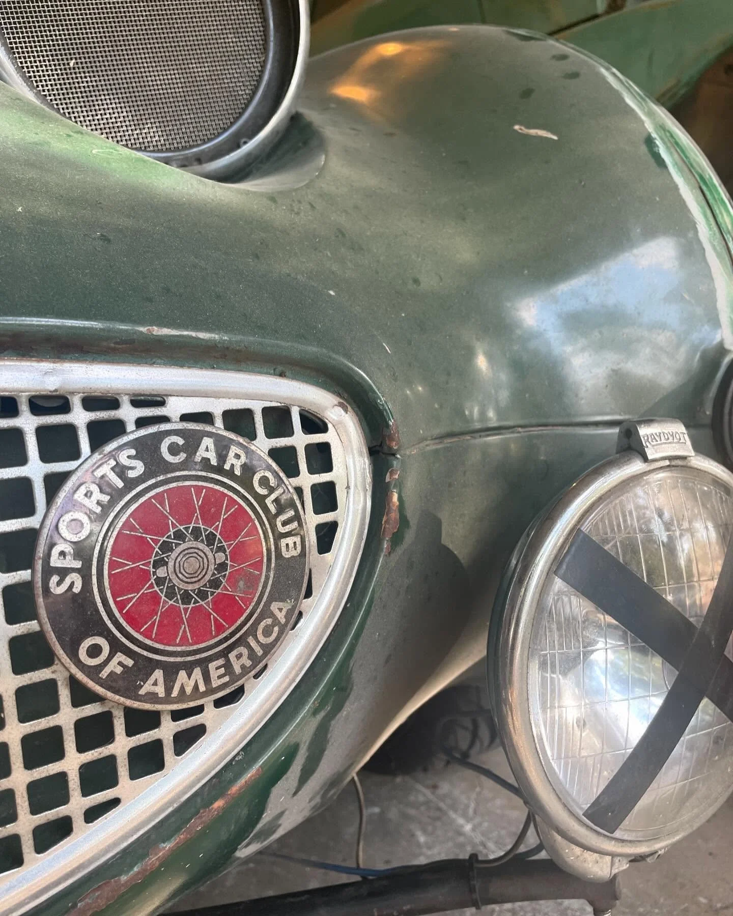 I took care of a few details on the Sprite today and took it on a little drive. I installed the oil cooler (though not plumbed til I finish breaking in the new engine) and safety wired the hardware. Then I installed the bonnet, added freshly painted 