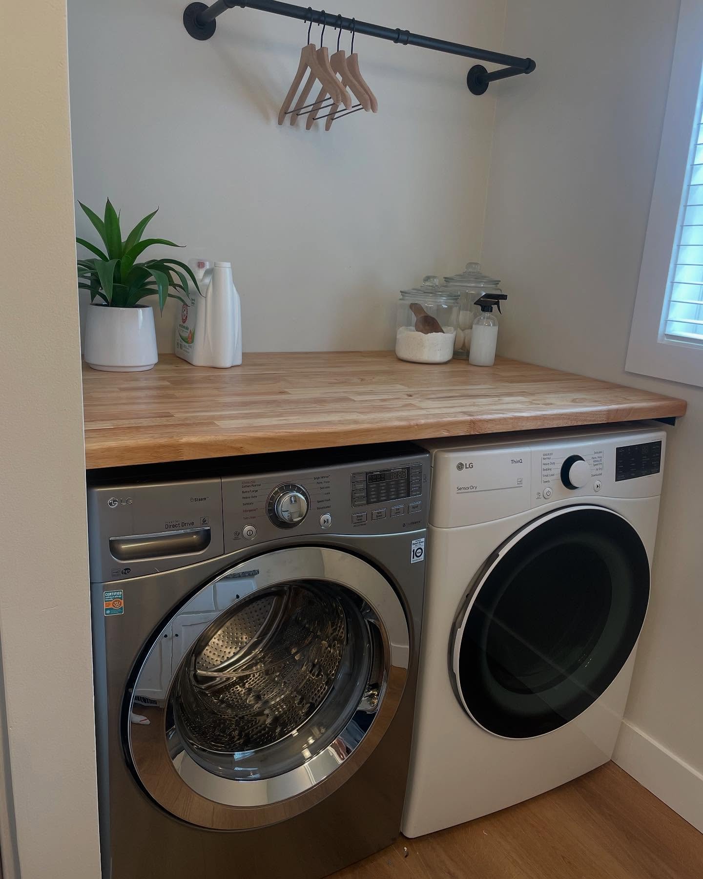 As soon as I saw the laundry room in our house, I knew a butcher block counter top would be a great addition to increase the esthetic of the space and to improve the functionality with clothes not being able to fall in the gap behind the washer/dryer