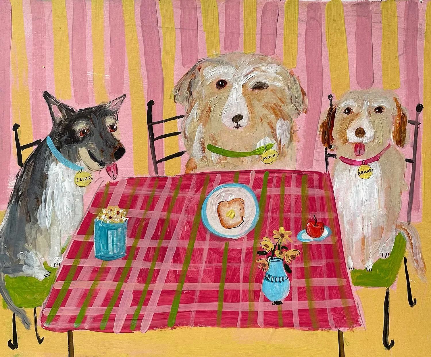 Painting of three dogs sitting around a dining table with a red checkered tablecloth, set with a plate of toast with butter, a cup of popcorn, a plate with a cherry, and a small vase with flowers. The background has pink and yellow vertical stripes. 