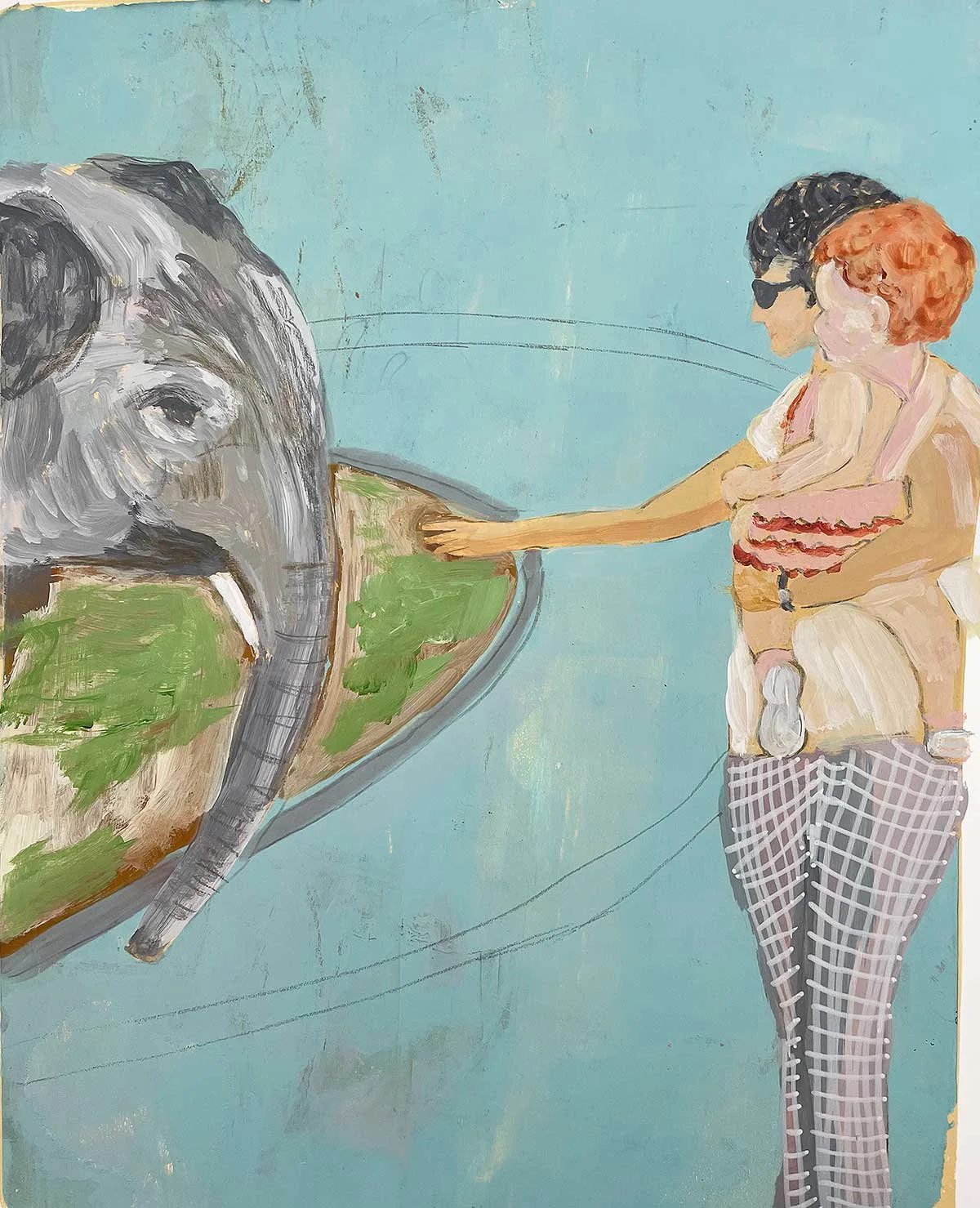 My grandma showing me how to pet the elephant at the zoo.