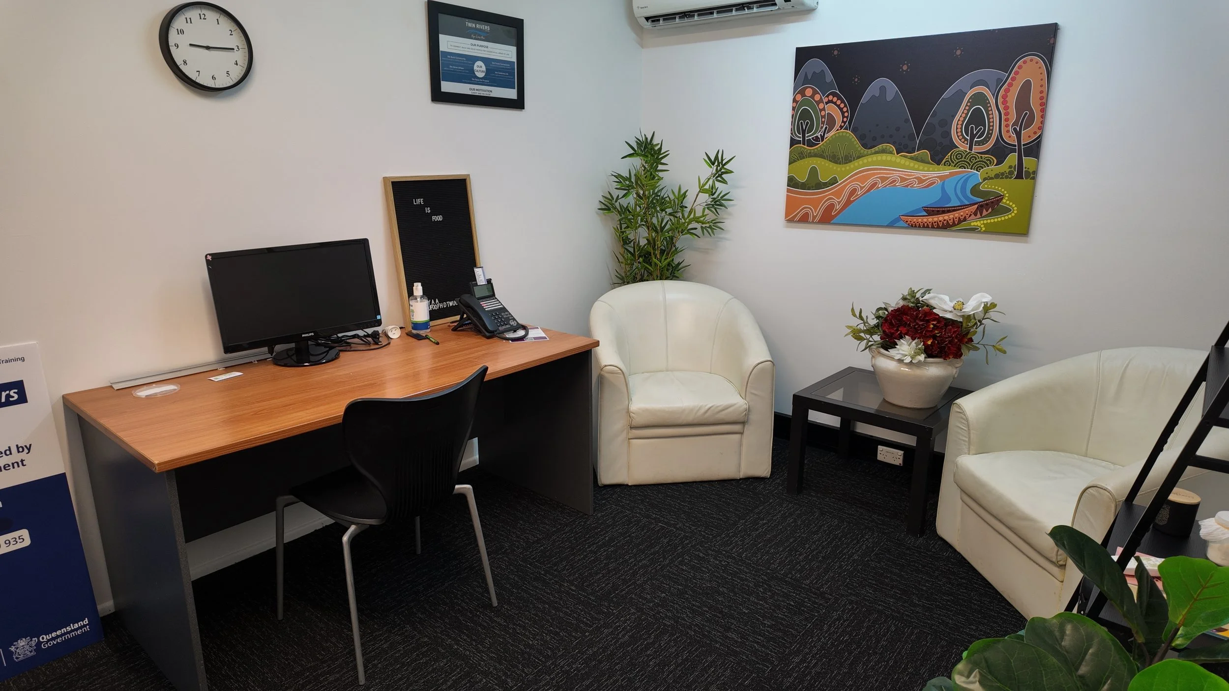 Office with desk and seating