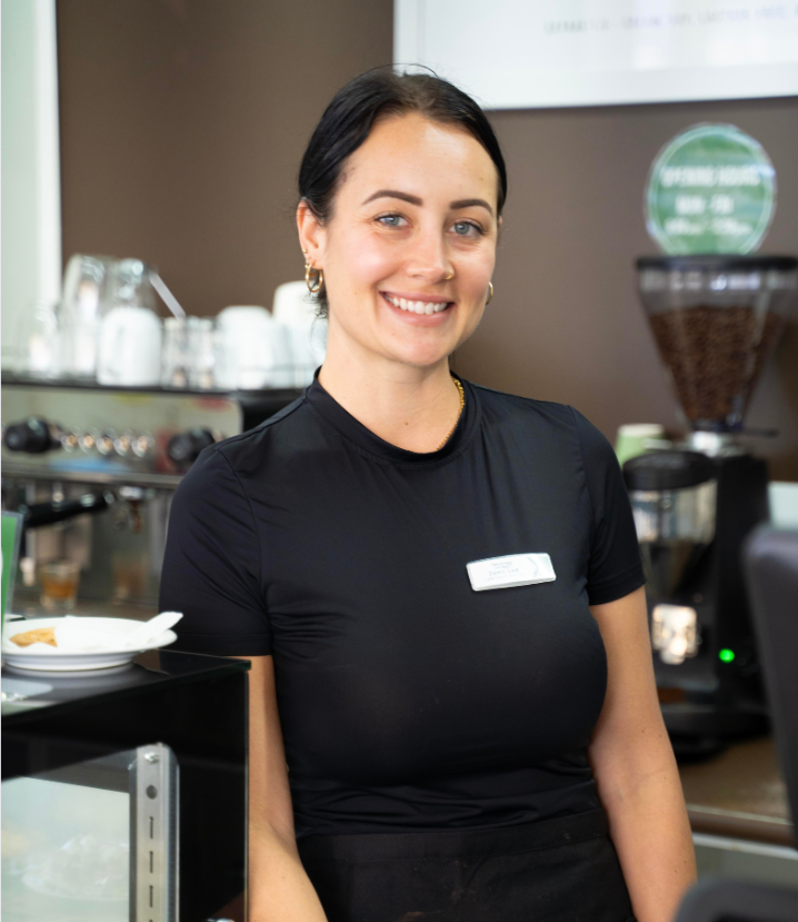 Barista smiling at the rivers cafe