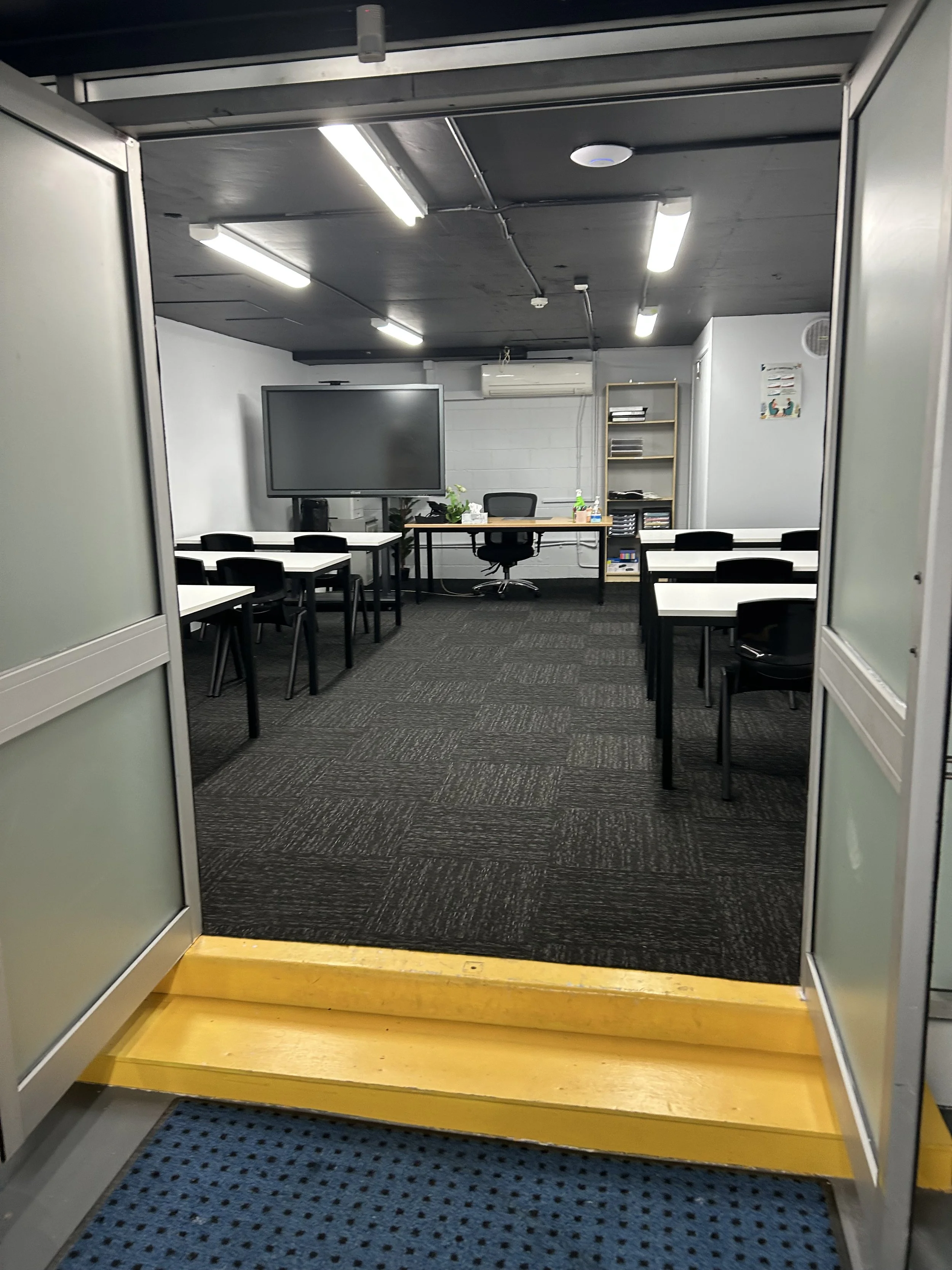 Training room with desks and seating