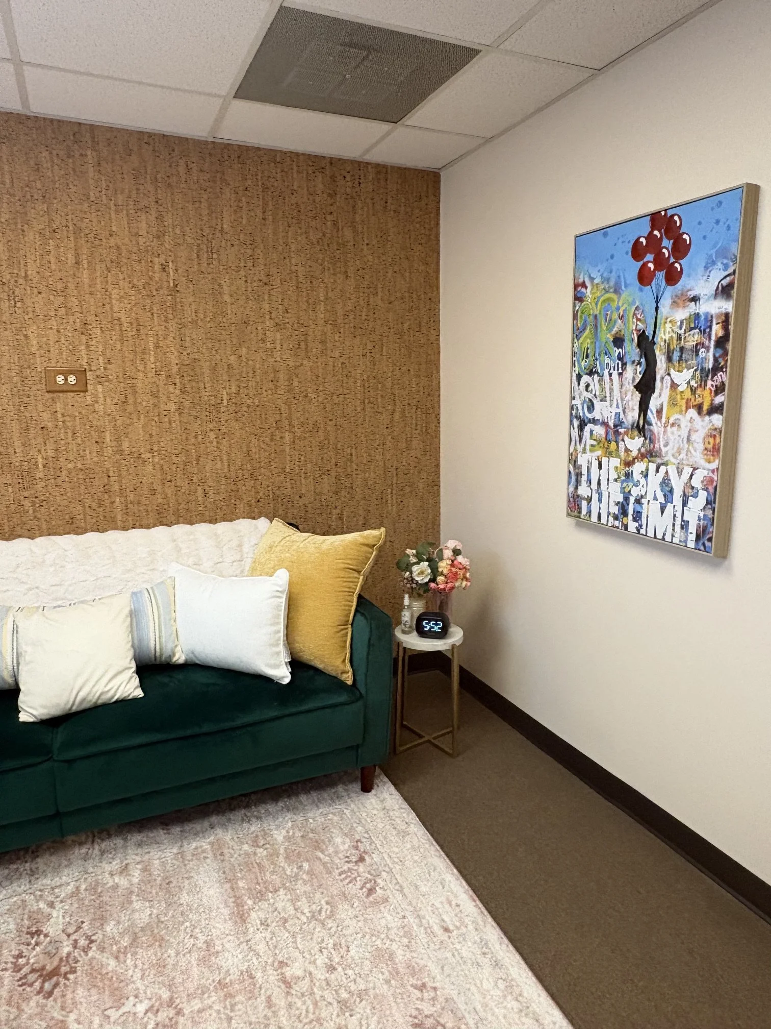 green couch in therapy room