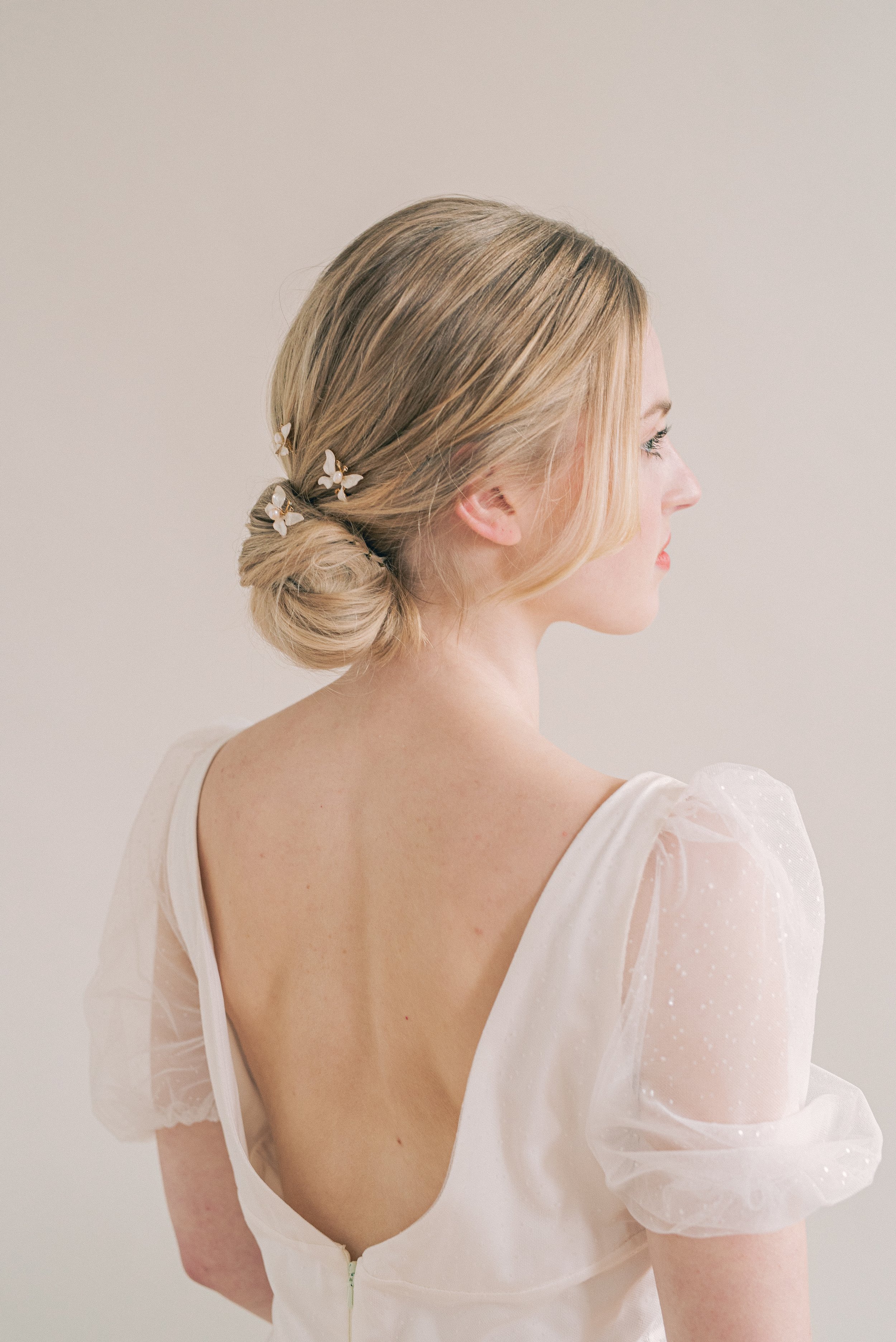 Images of Lake District wedding hair and makeup for the natural bride, covering Cumbria and Lancashire. Fashion-led bridal hair and makeup. Naturally fresh makeup paired with modern hairstyles for fashion bridal editorials. Photographer Emma Pilkingt