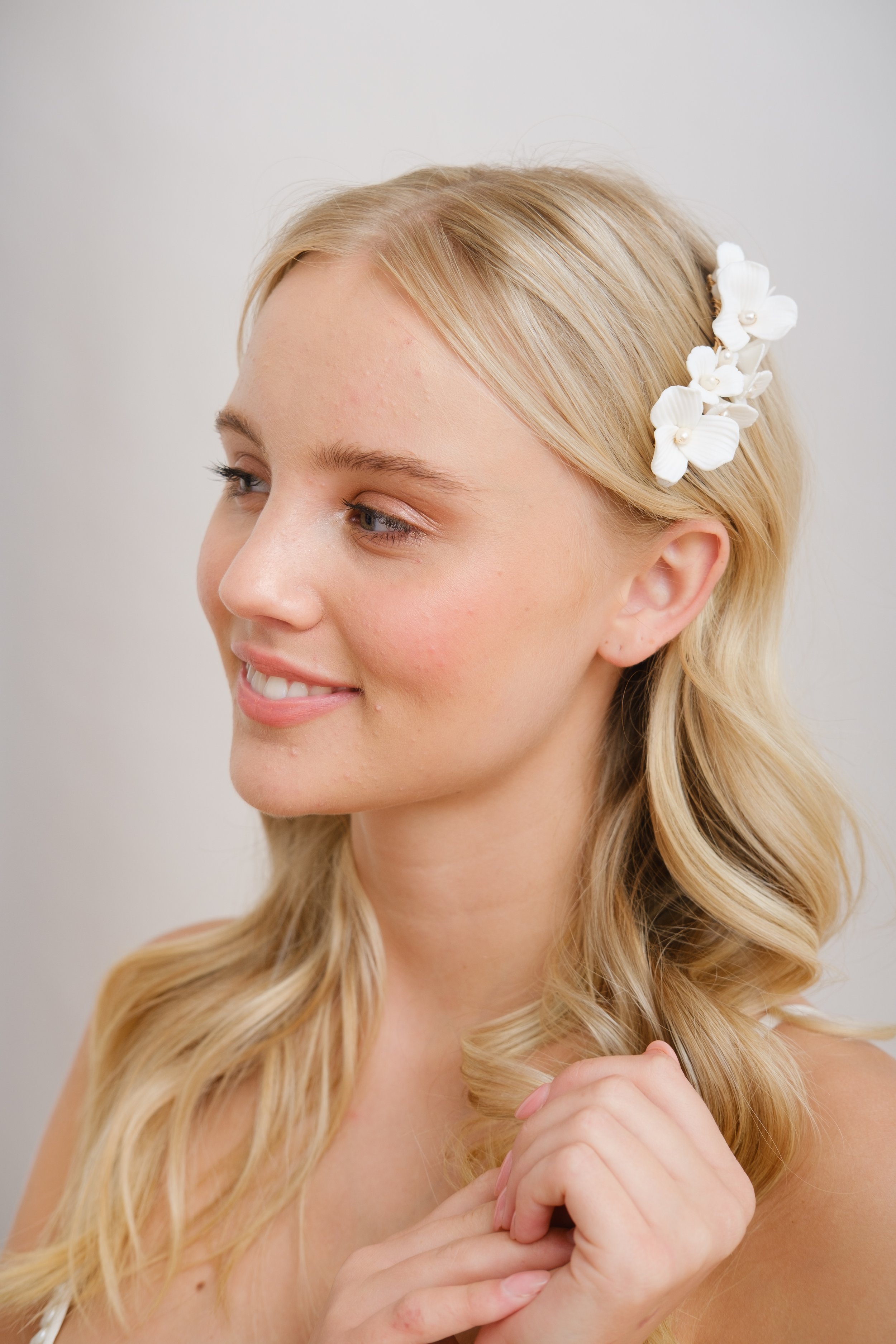 Images of Lake District wedding hair and makeup for the natural bride, covering Cumbria and Lancashire. Fashion-led bridal hair and makeup. Naturally fresh makeup paired with modern hairstyles for fashion bridal editorials. Photographer Emma Pilkingt