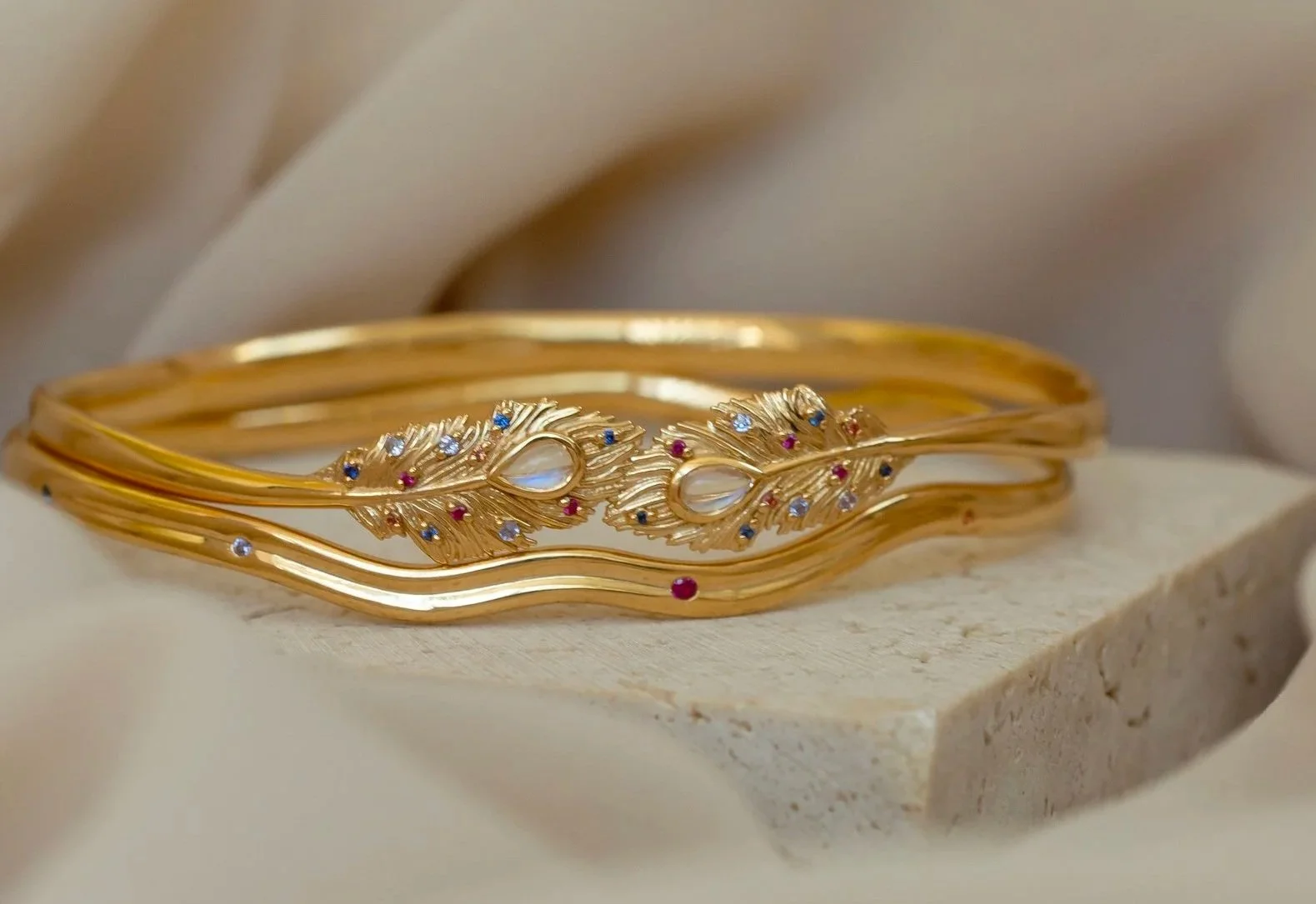 Heulwen-Lewis-Bespoke-Ruby-Sapphire-Moonstone-Birthstone-Peacock-Bangles