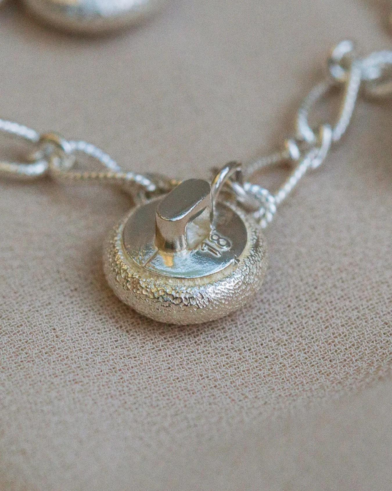 If you have seen my bridal button&trade;️ concept and thought &lsquo;oh I wish I had seen that before my wedding!&rsquo;, no need to worry, you can still create a beautiful button charm from your existing gown buttons. 👰

This is what Rachel did wit