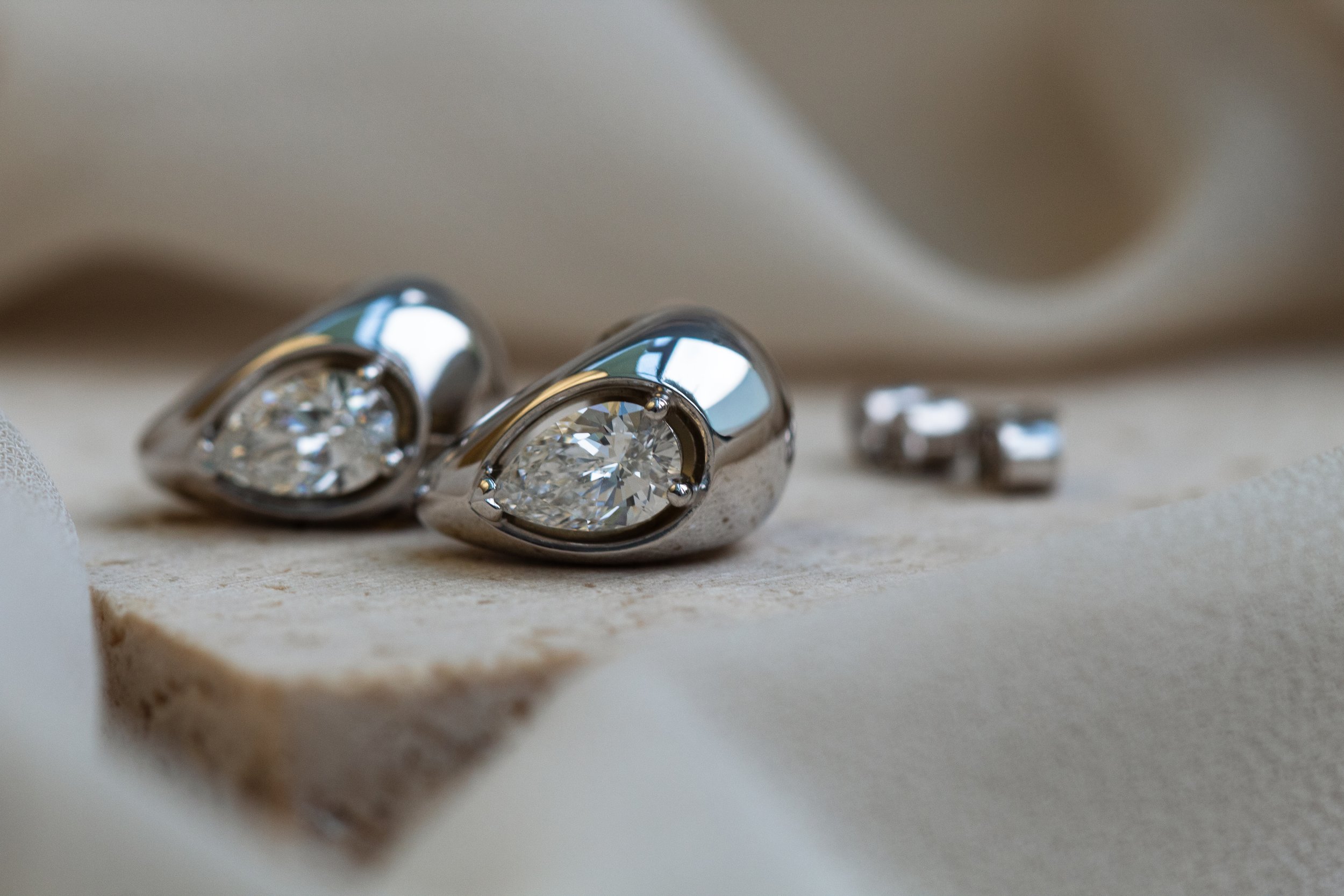 Heulwen-Lewis-Bespoke-Pear-Diamond-White-Gold-Huggie-Earrings