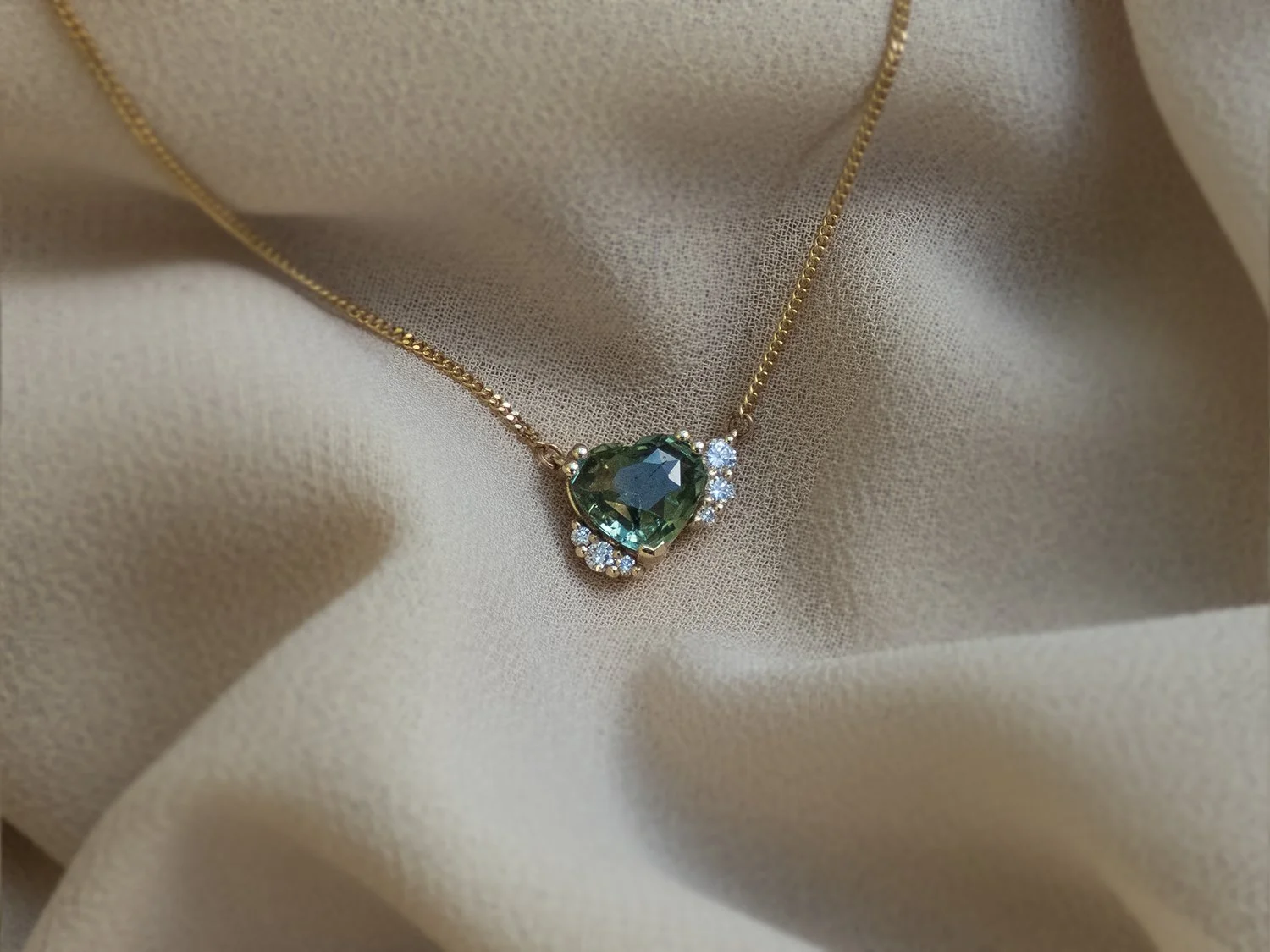 Heulwen-Lewis-Bespoke-Green-Heart-Sapphire-Diamon-Sprinkle-Pendant