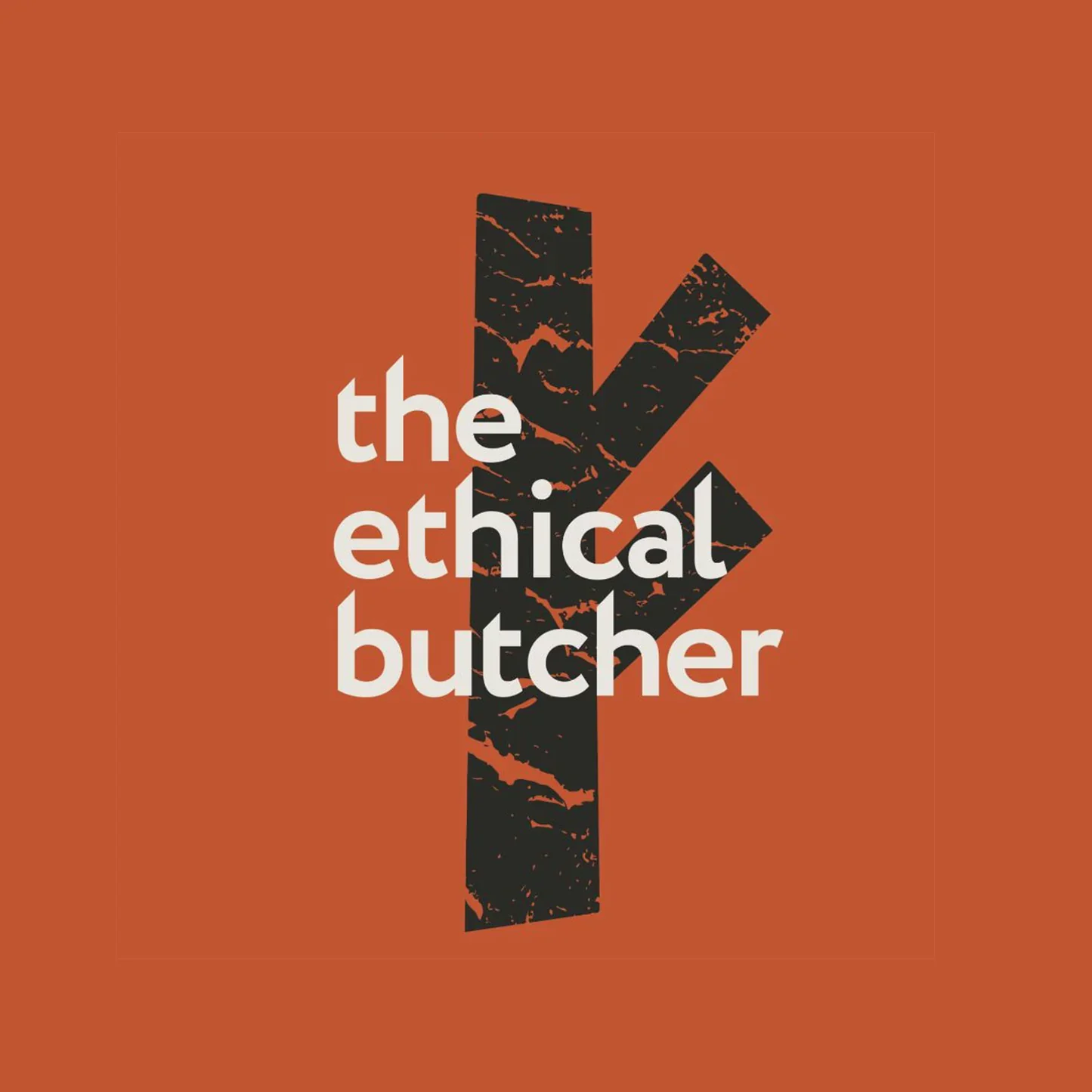 A graphic design featuring the phrase "the ethical butcher" overlaid on a stylized black and orange image resembling a butcher's cleaver or meat cleaver against an orange background.