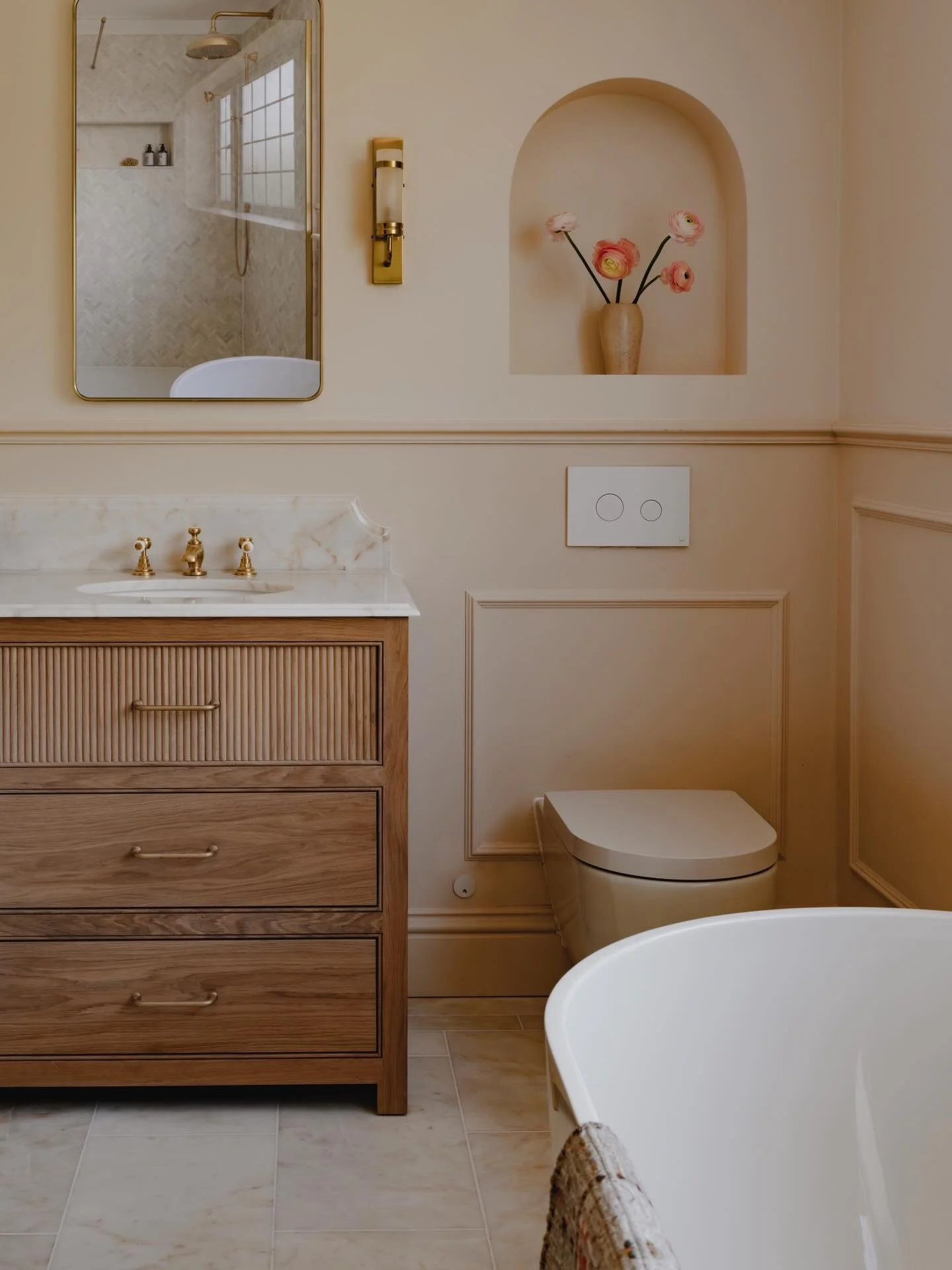 A principal bathroom designed to feel like a natural extension of the bedroom beyond &mdash; with soft, calming tones flowing beautifully throughout to create a sanctuary for everyday self-care. 

The bespoke vanity by @jackmeadowsbespoke really defi