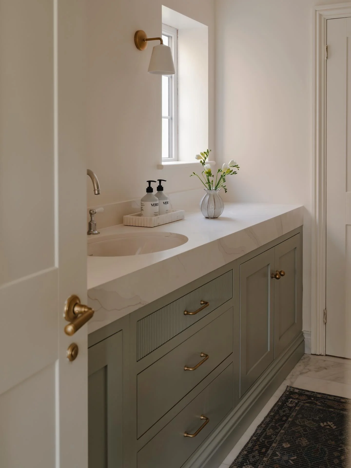 Designed to feel bright, uplifting and quietly calming all at once. The soft blue vanity brings a gentle sense of calm, while the mix of warm brass and chrome finishes adds depth and a more collected, timeless feel.

Because bathrooms should feel jus