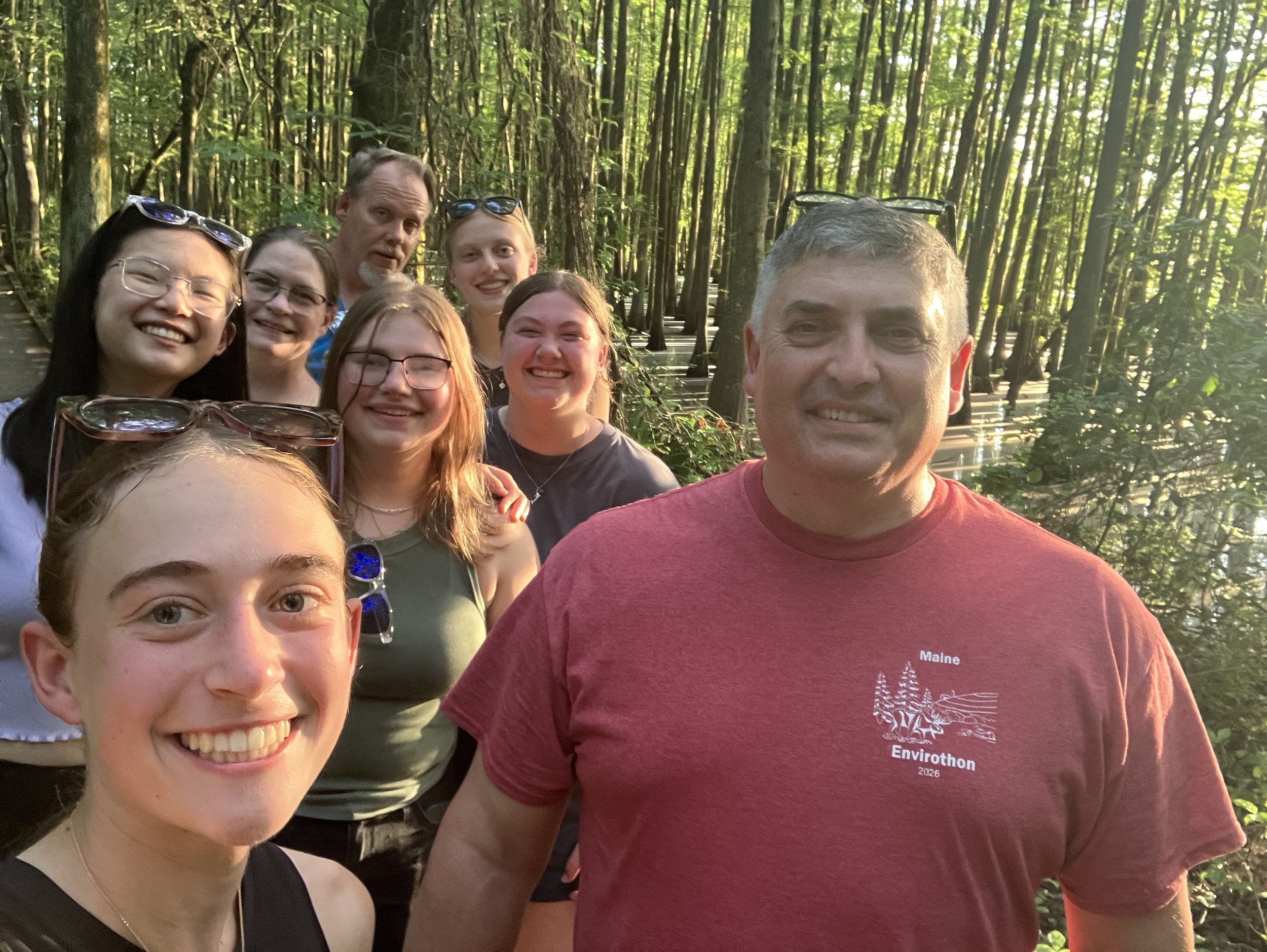 Team and advisors at a cypress swamp