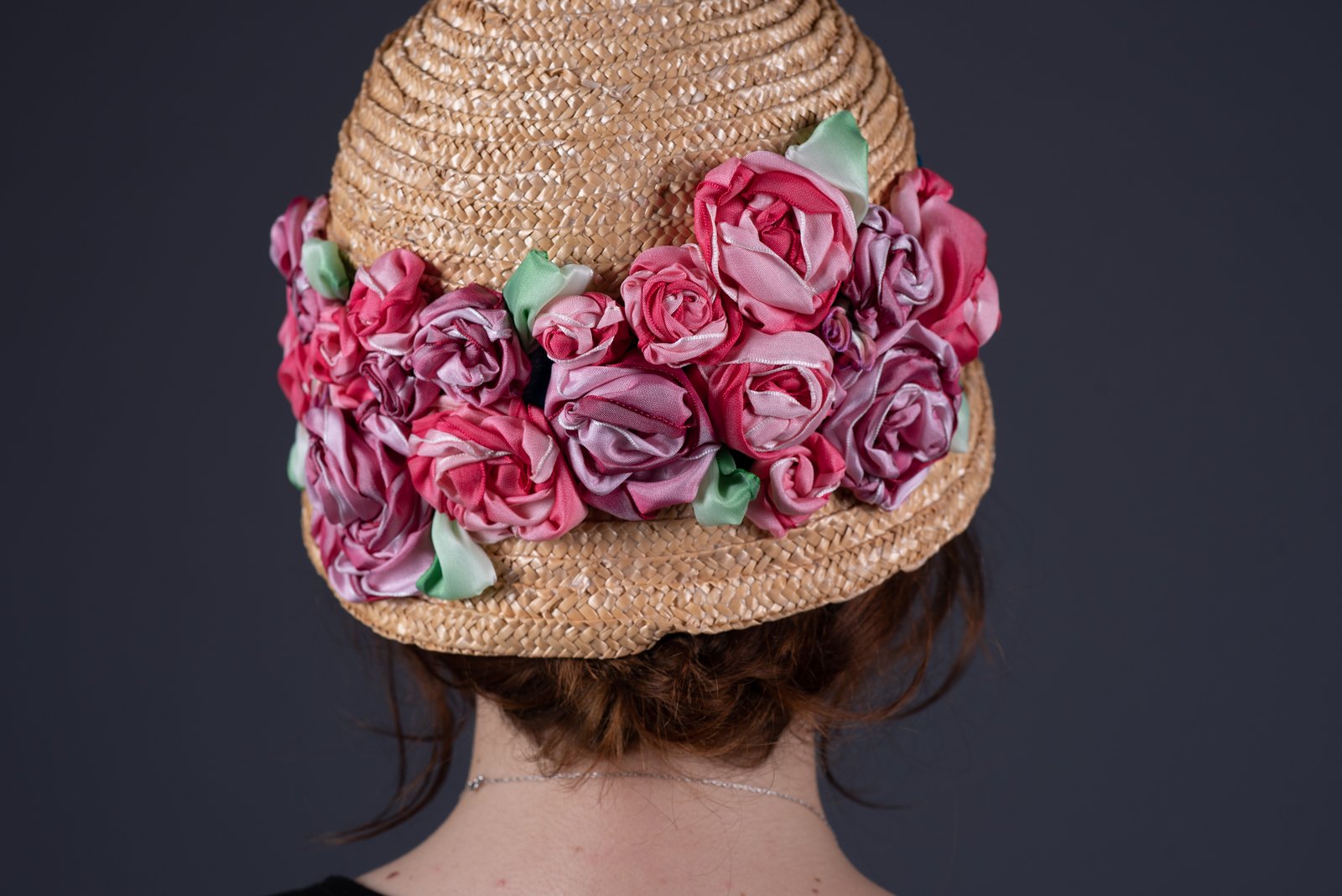 Dainty 1920's Roses cloche, made by hand and trimmed with jewel-toned blue velvet ribbon and hand embellished with hand made silk roses.