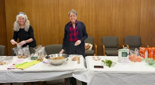Making Passover bags for members of the community.
