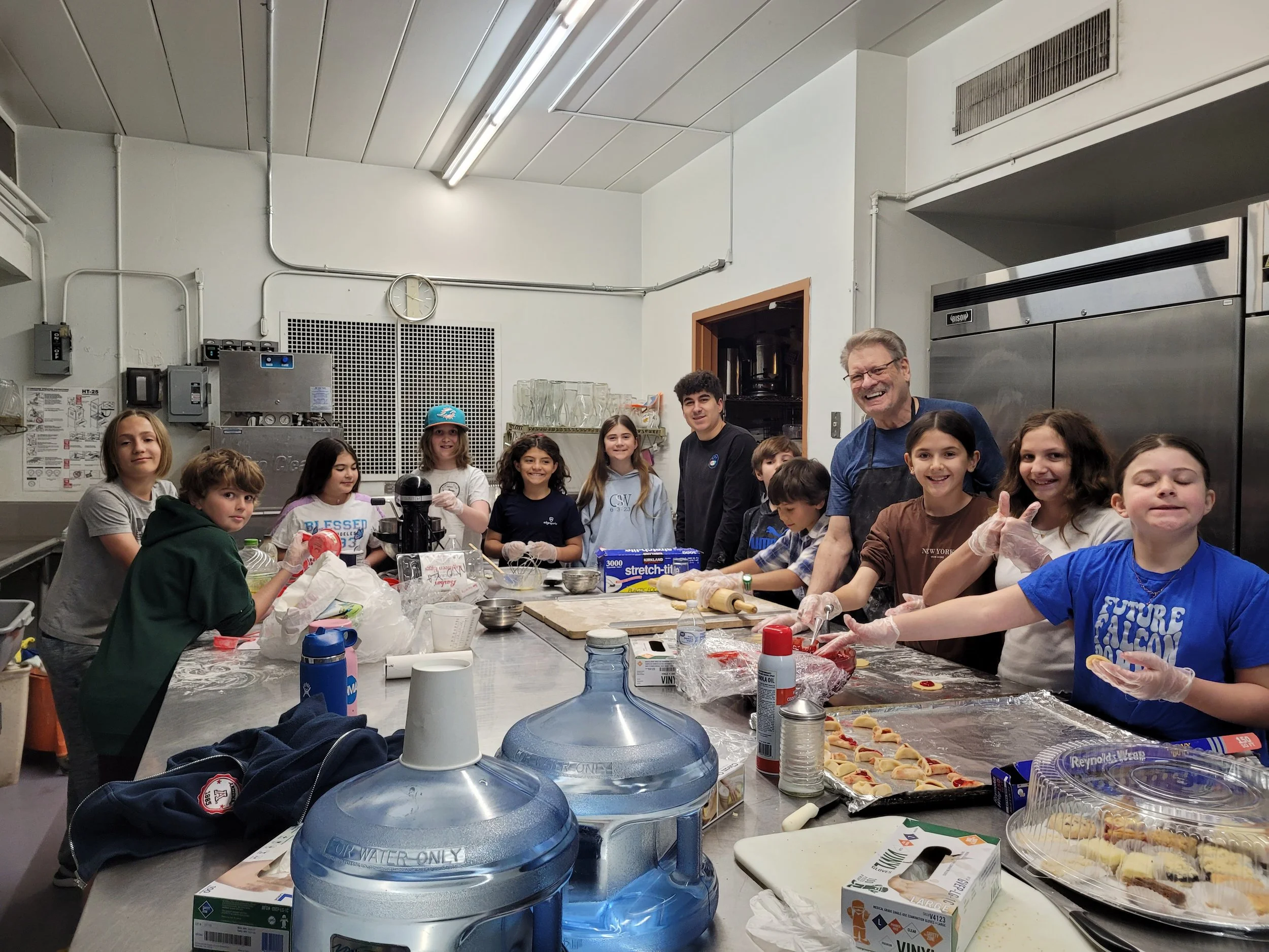 Religious School Students Making Hamentashen with the Men of Kol Ami