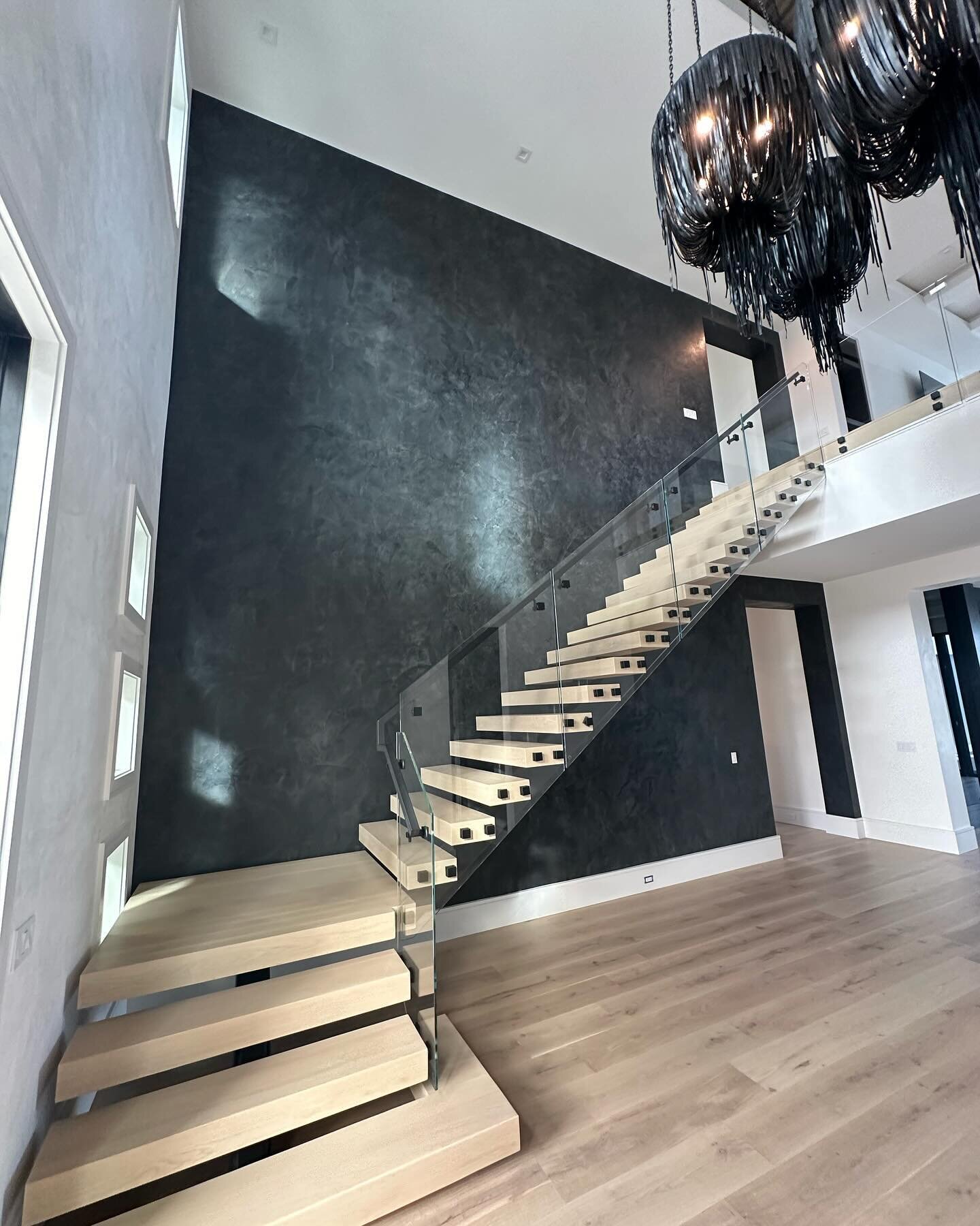 Big accent wall in black Venetian Plaster. Always great working with @angelareynoldsdesigns. Between plastering the walls, the amazing lighting, furniture, and beautiful marble slabs, this house is a show stopper. Can&rsquo;t wait to see it completed