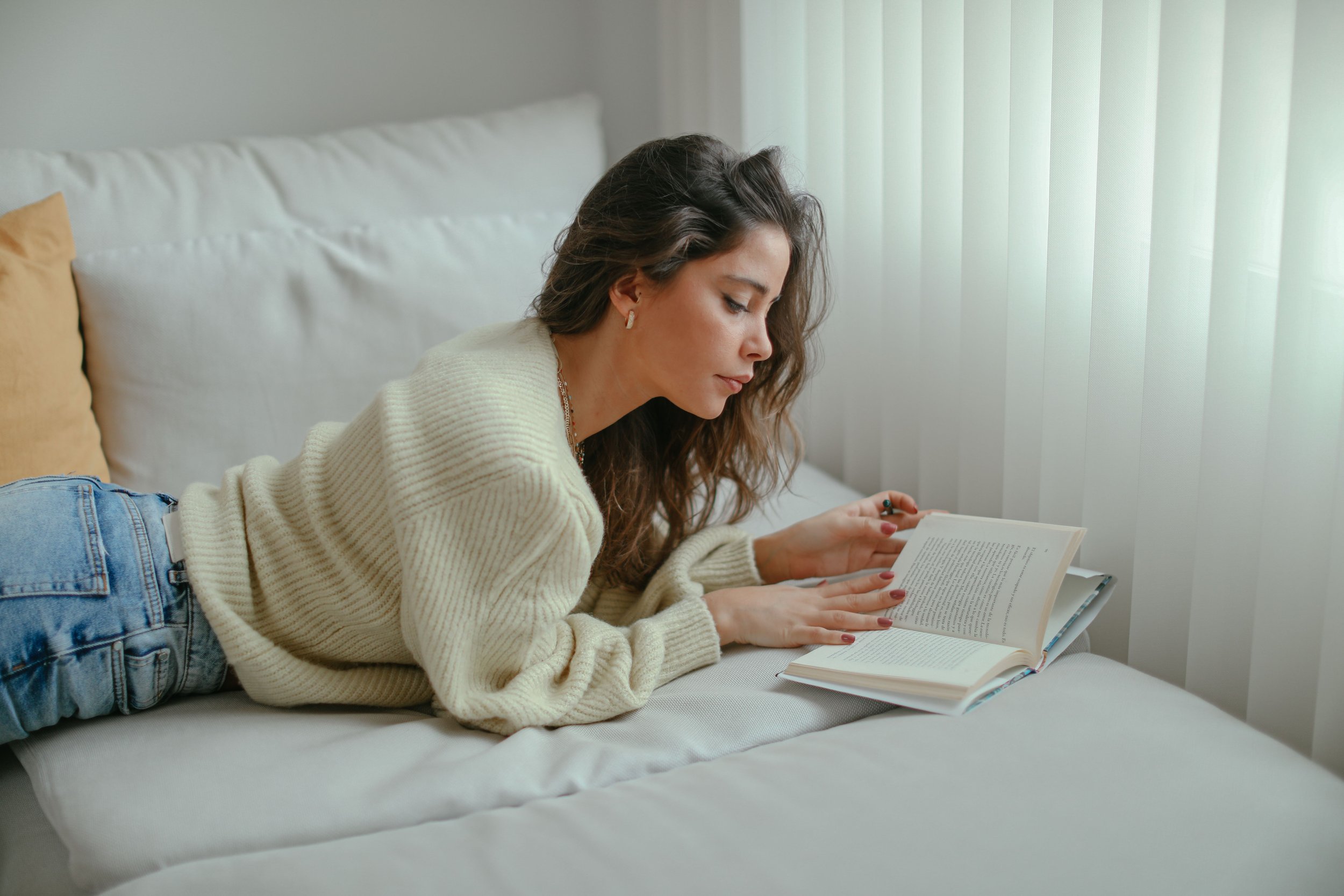 woman reading about woman empowerment