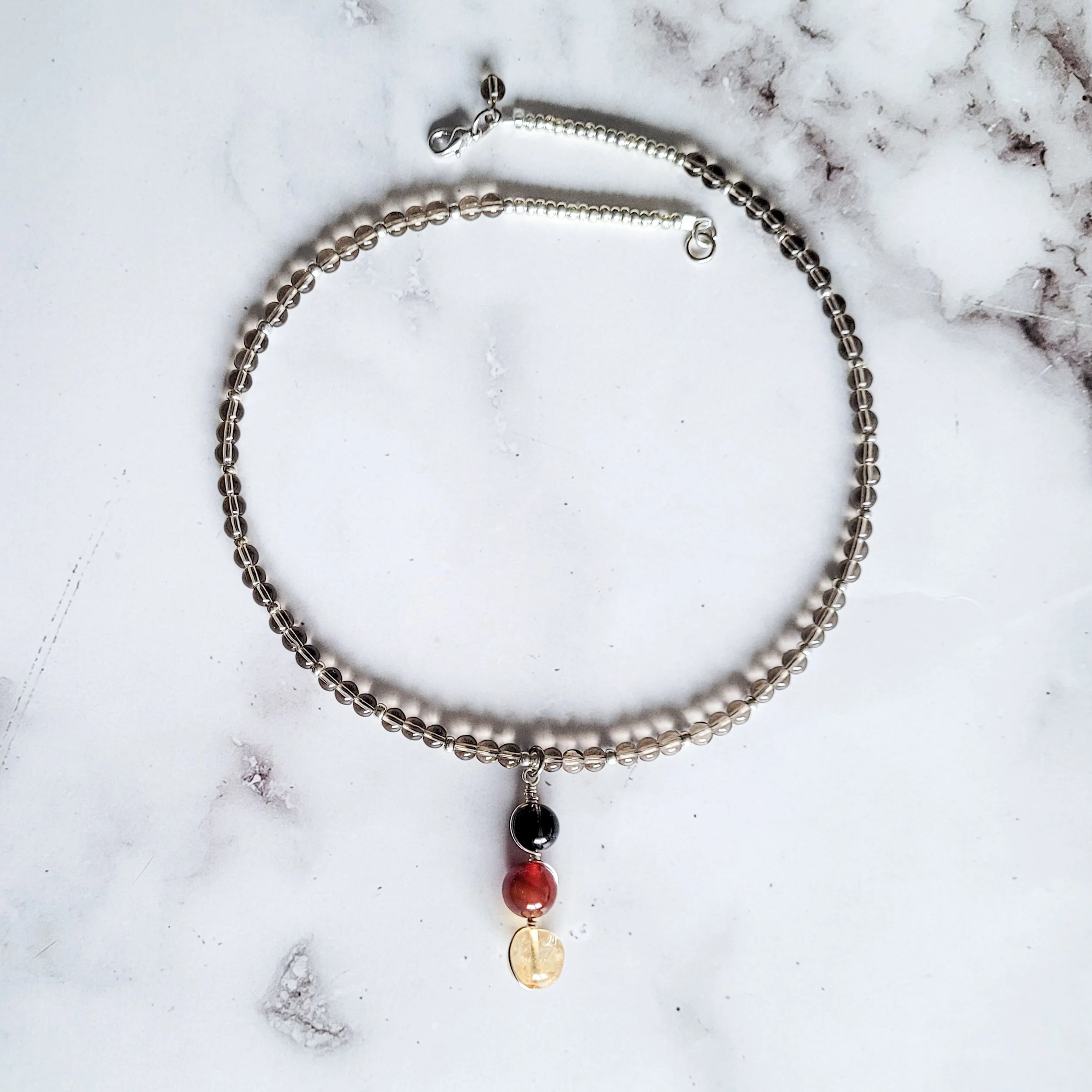 Smoky quartz necklace with gemstone pendant trio featuring smoky quartz, carnelian, and citrine