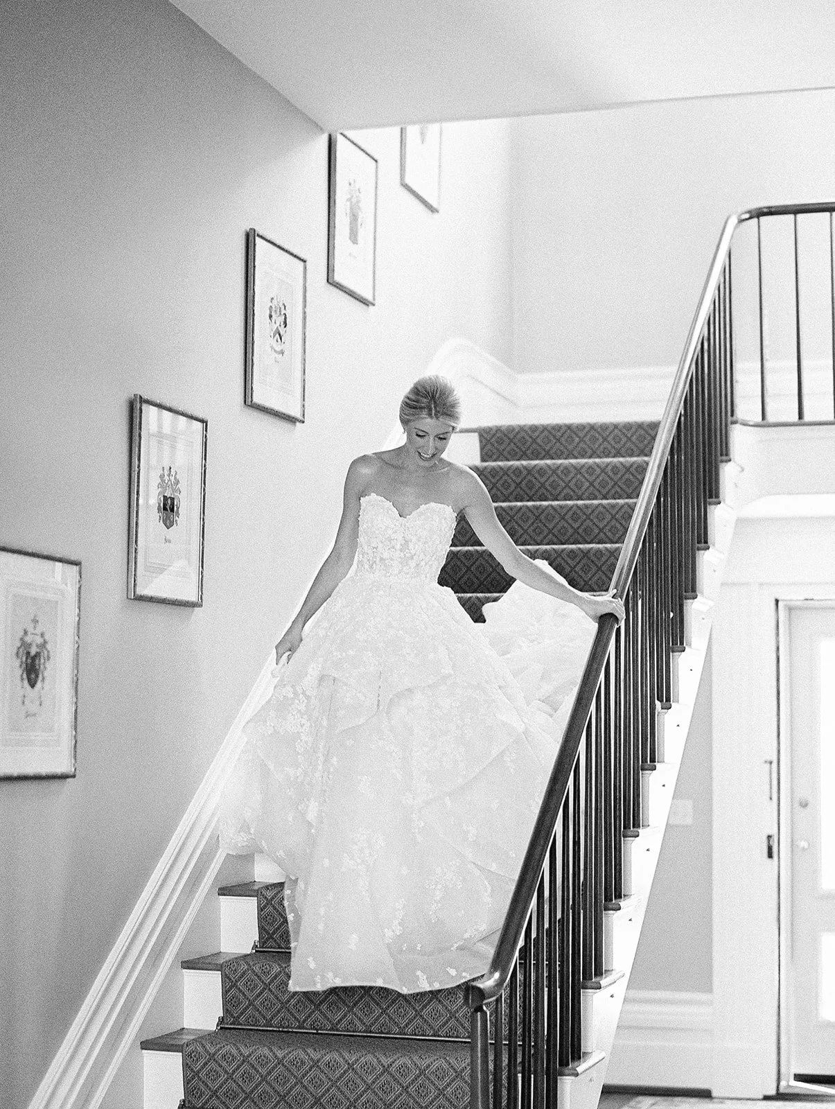 Bride coming down stairs of family paris ky estate on wedding day