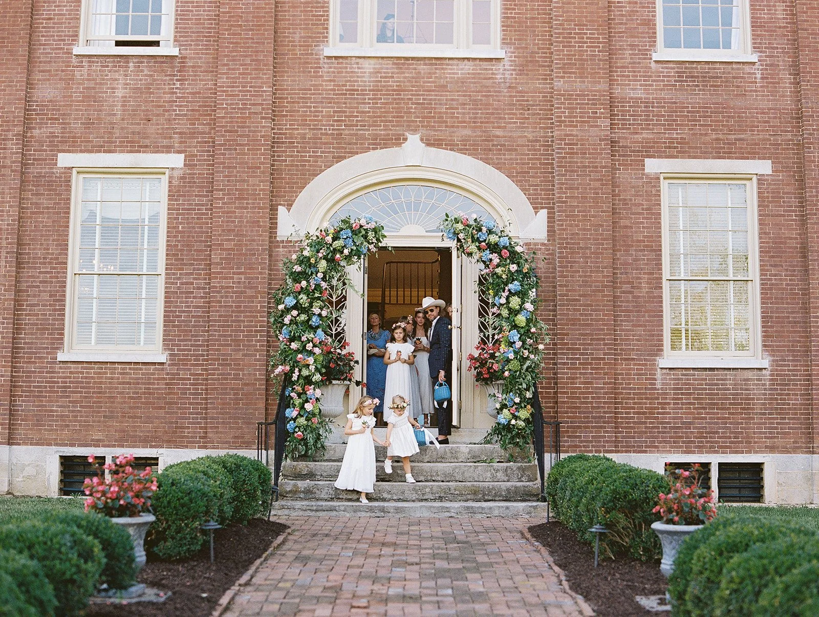 Makers House™ helping flower girls and designer bride down ceremony aisle at paris ky wedding
