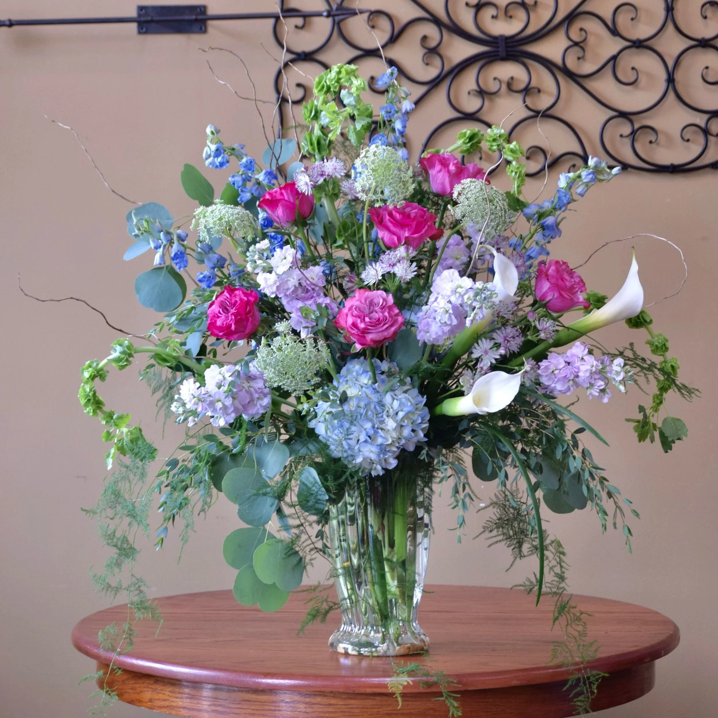 White, Purple, Blue, and Pink Vase Arrangement