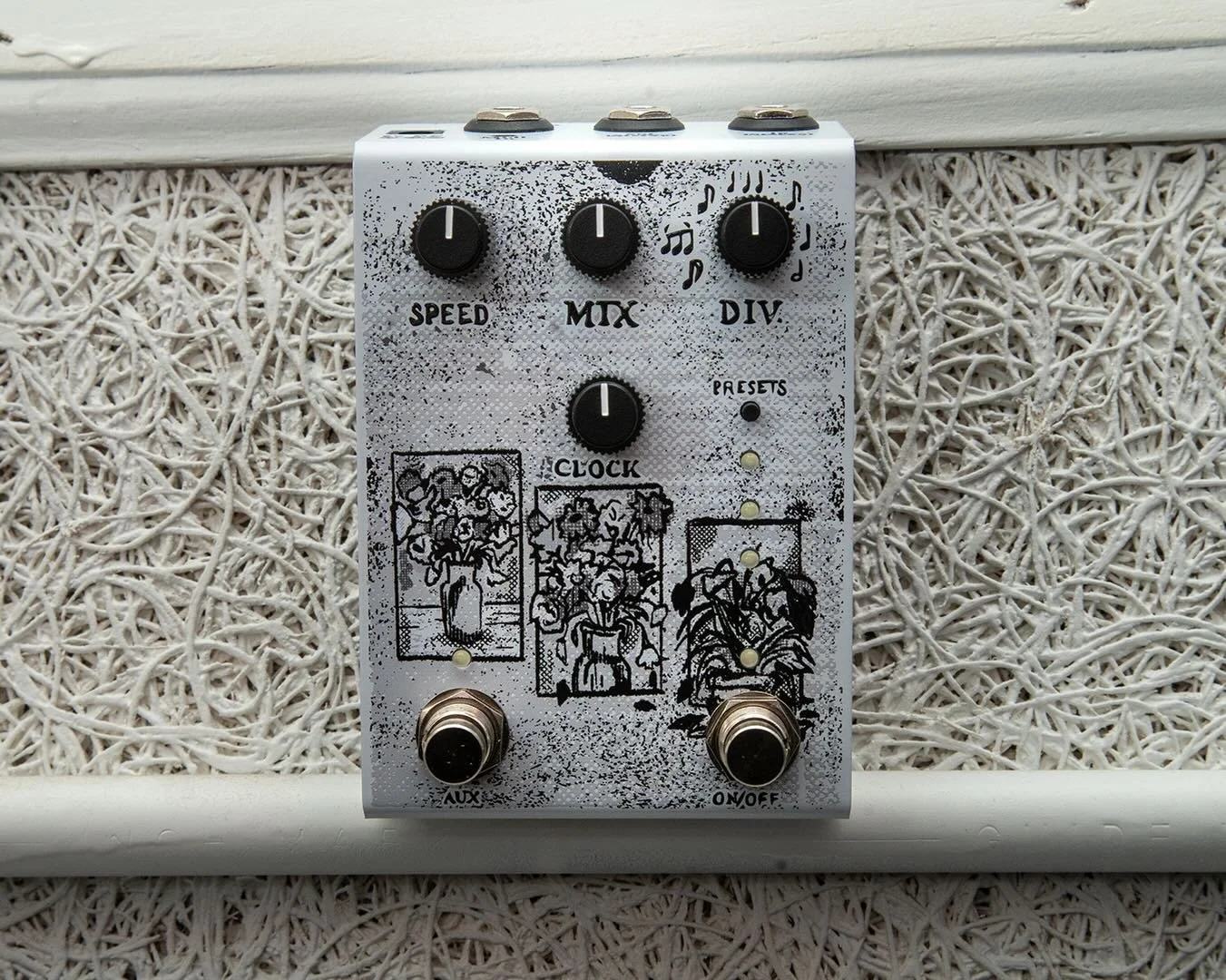 like an old newspaper print. petunia setback.