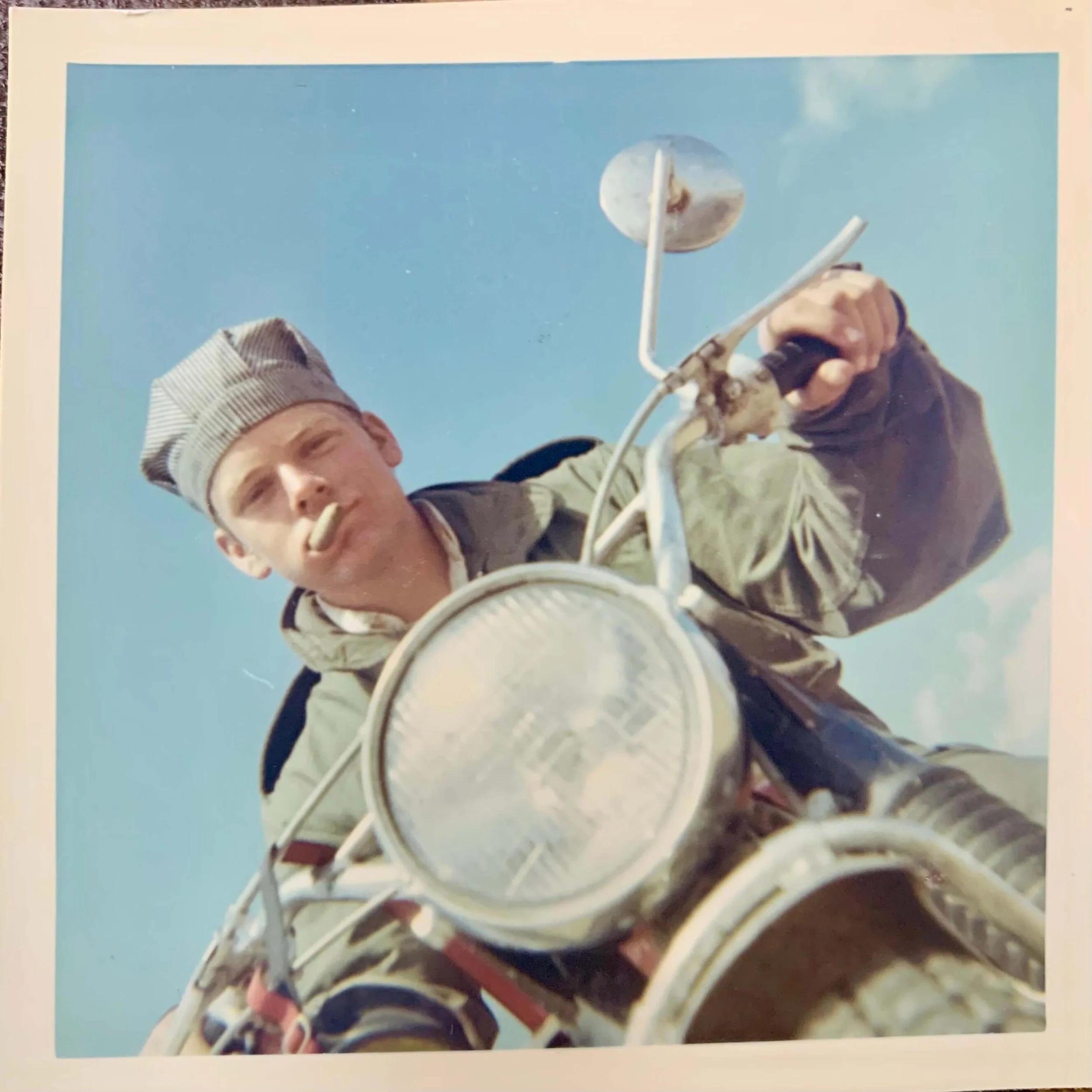 Tim: Smoking a cigar on the road.