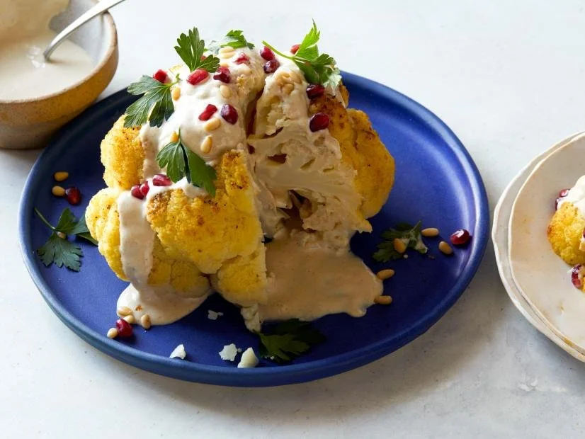Whole Roasted Cauliflower with Pomegranate and Tahini
