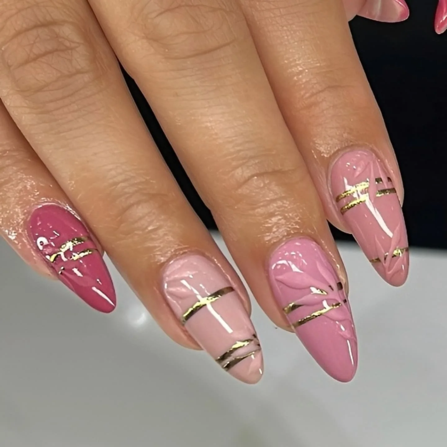 Pink perfection accented by crisp gold lines and soft leafy design for an elegant finish. 💛

#yycnails #yycnailsalon #nailart #naildesigns #yycnailart