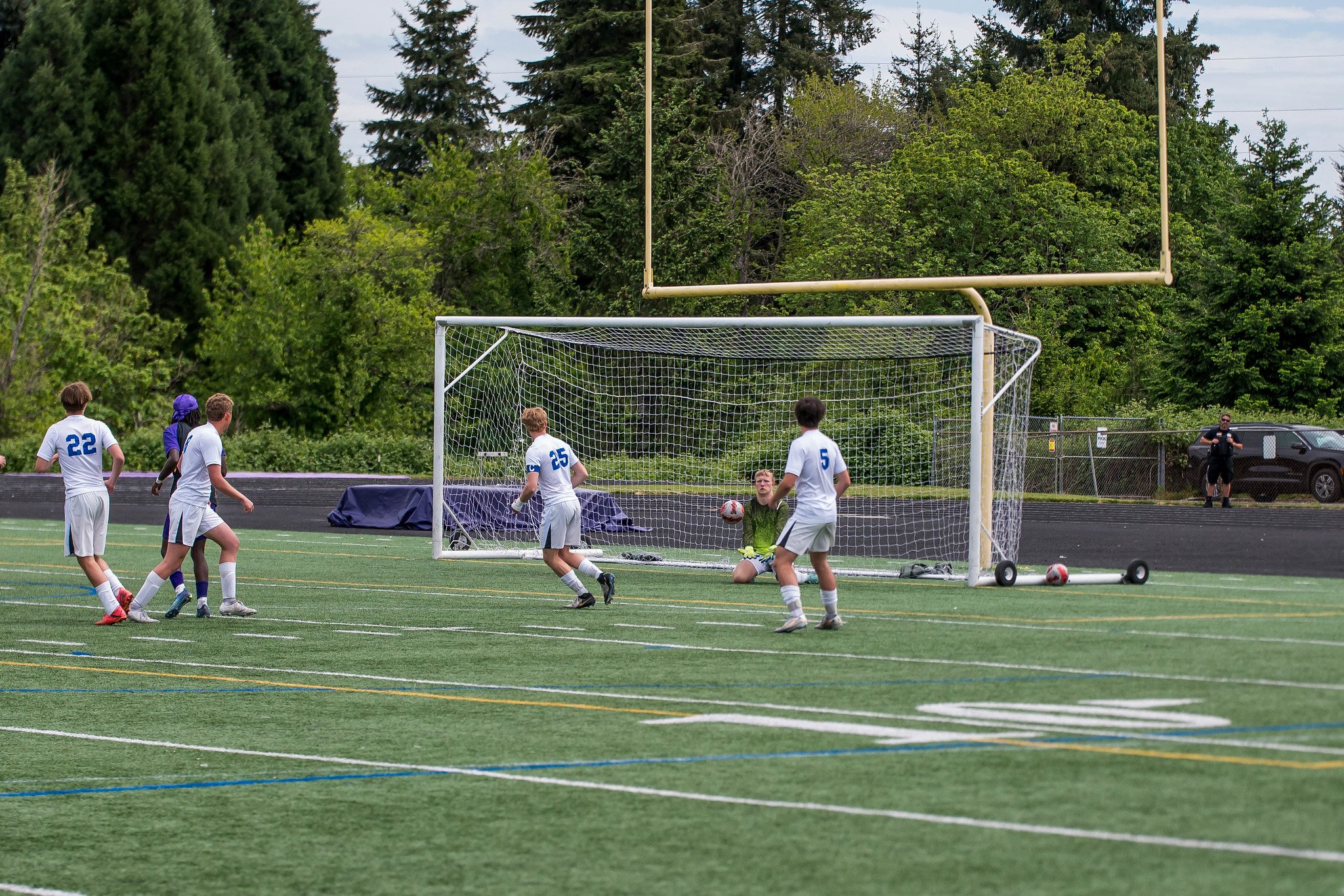 Saved: low shot from ~10 yards