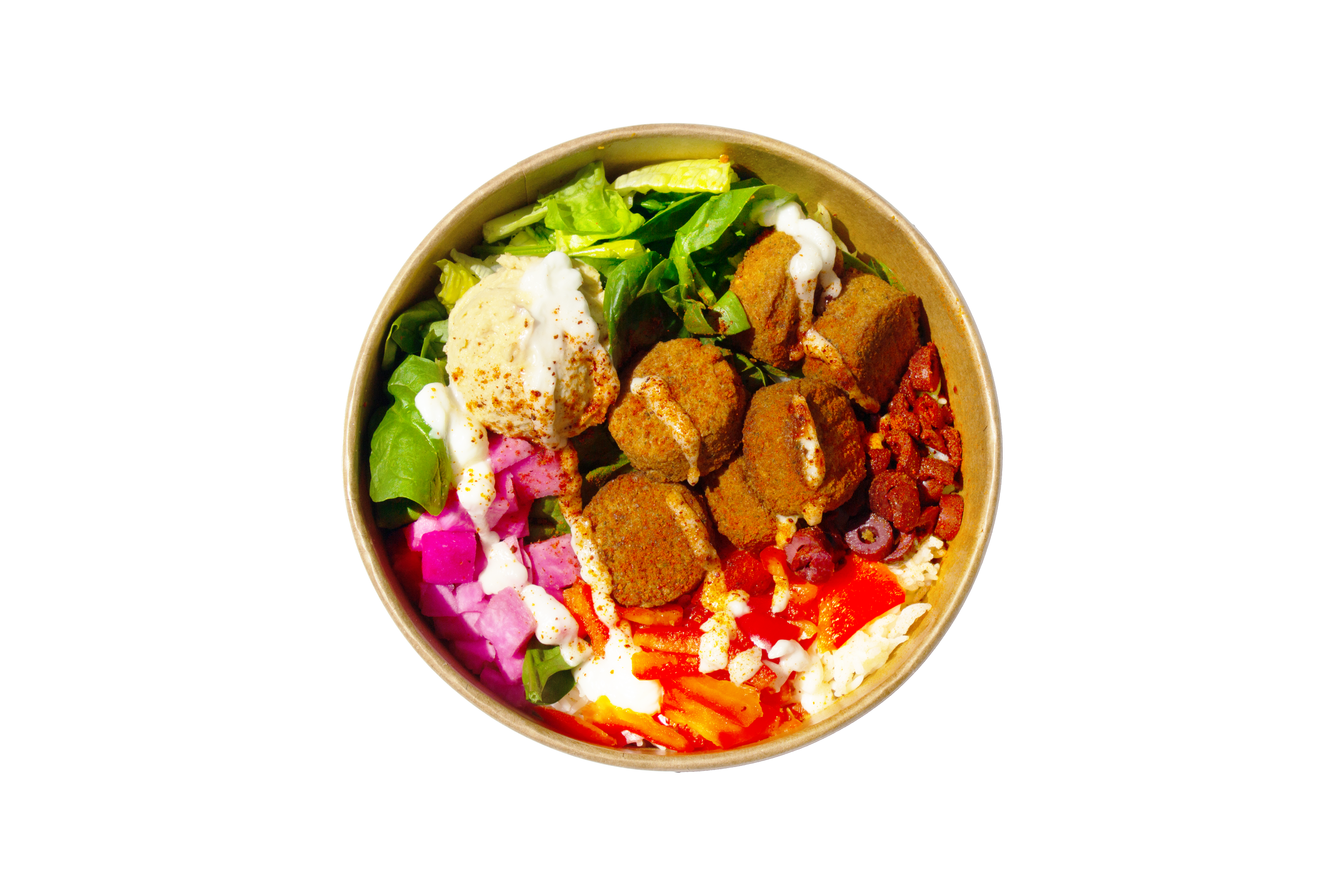 Salad box with roasted sweet potatoes, mushrooms, shredded beets, chopped onions, tomatoes, kale, chickpeas, almond slivers, and a container of dressing in the center.