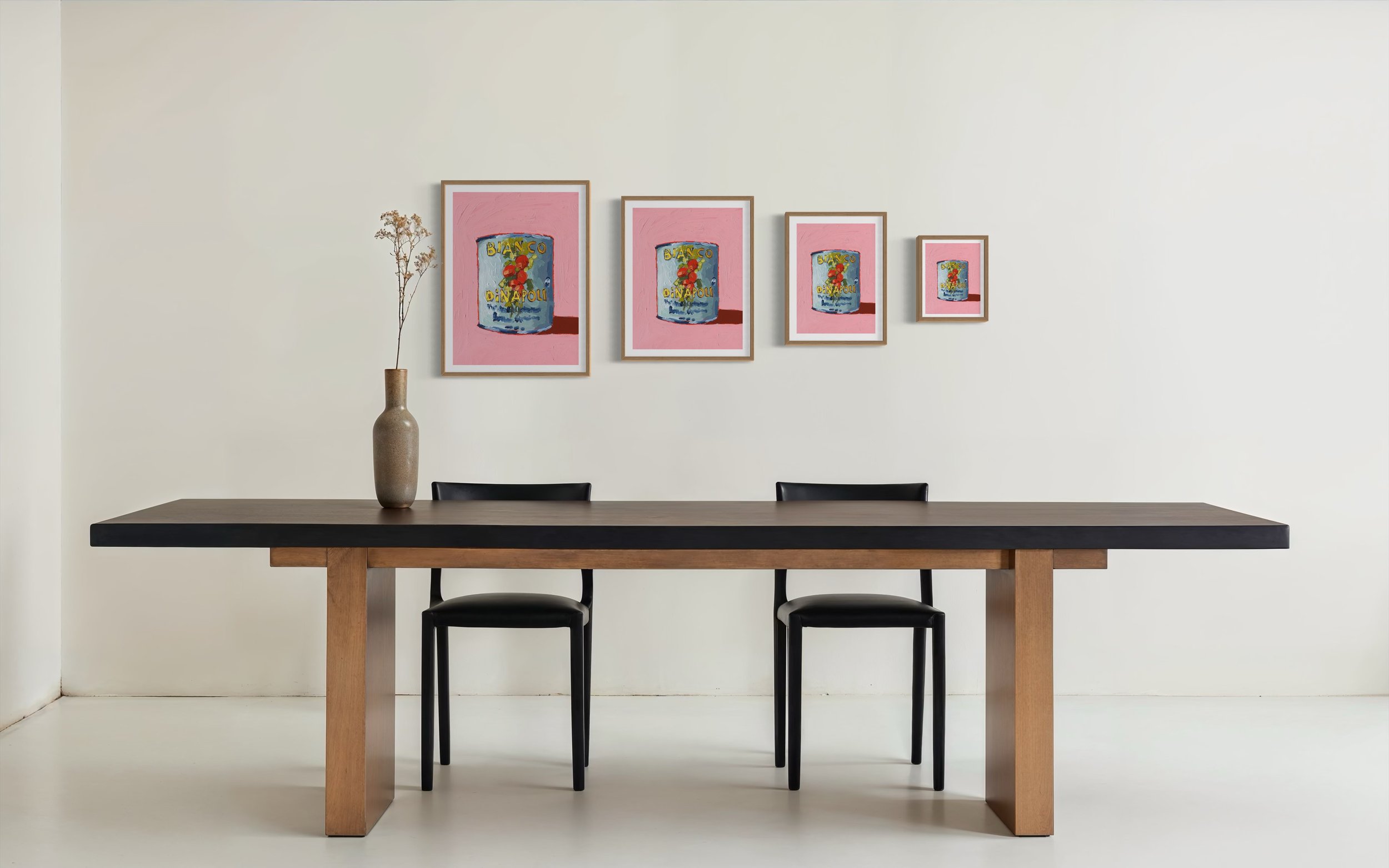 Whimsical kitchen decor featuring a tomato can against a pink backdrop