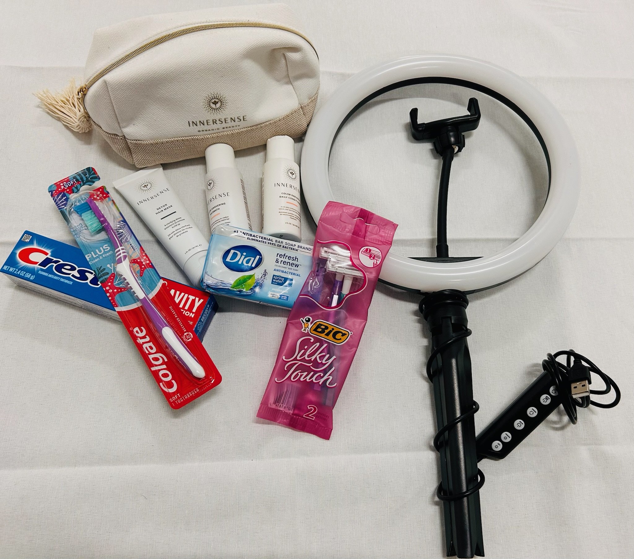 T #1_Toiletries Bundle (Ring Light, Razors, Soap, Toothpaste, Toothbrush, Innersence Hair Products)
