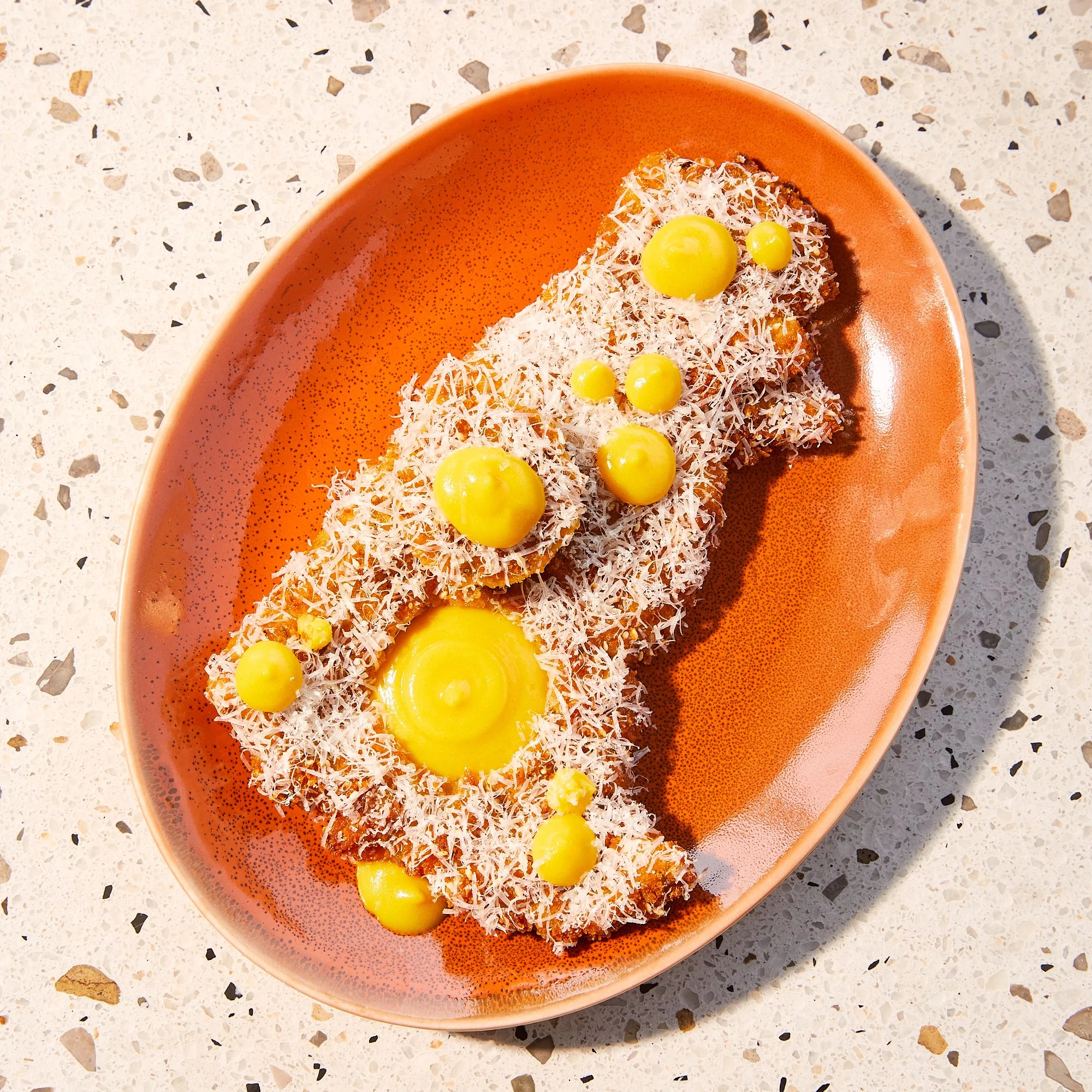 pork-schnitzel-crispy-orange-plate-crunchy-cheesy.jpg