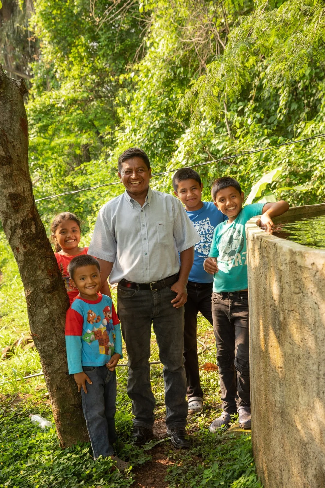 family-portrait-water-cistern-ngo-honduras-father-and-sons.jpeg