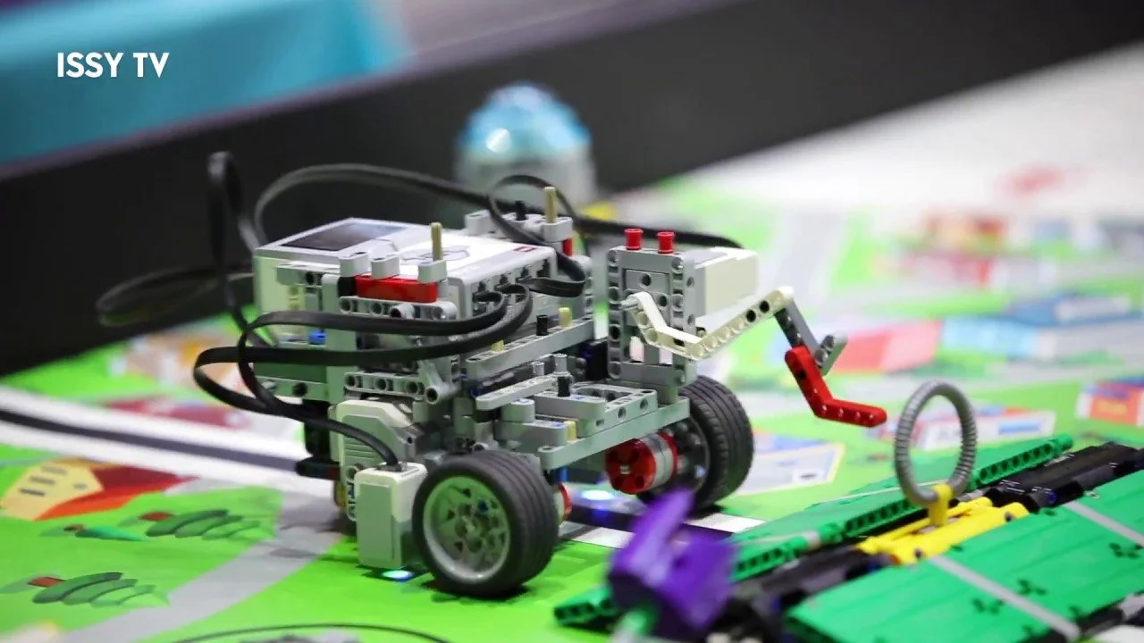 A close-up view of a different FIRST LEGO League robot, showcasing intricate LEGO engineering and sensors for competition tasks.