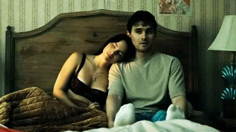 A shot of nikki and bear from the movie obsession