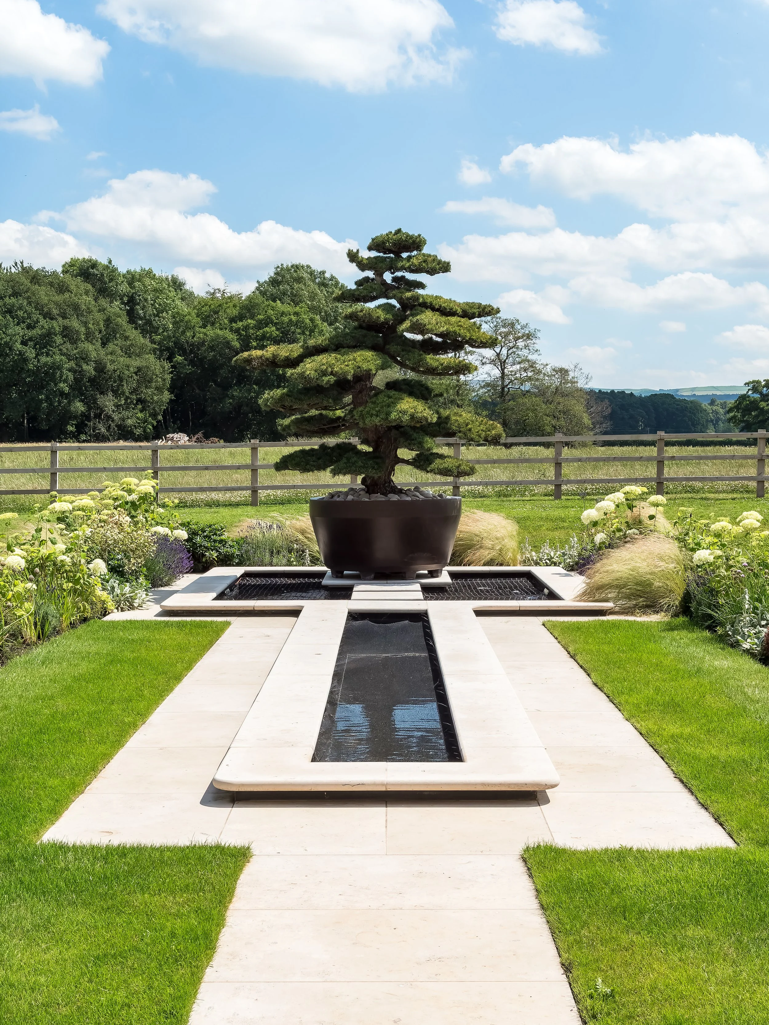 A tranquil koi pond, positioned with intent