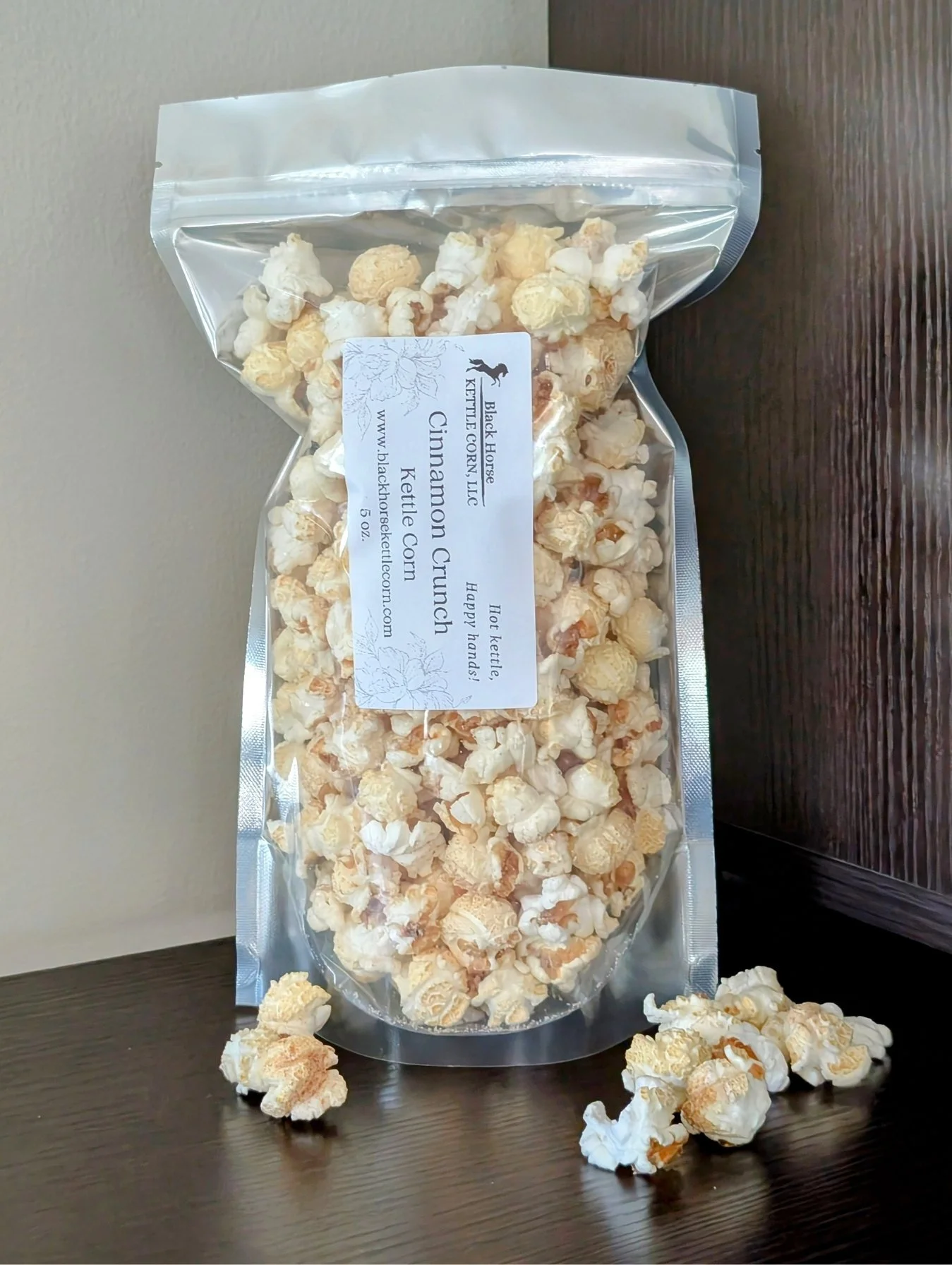5 oz bag of Cinnamon Crunch Kettle Corn — churro-inspired popcorn, Black Horse Kettle Corn branding.