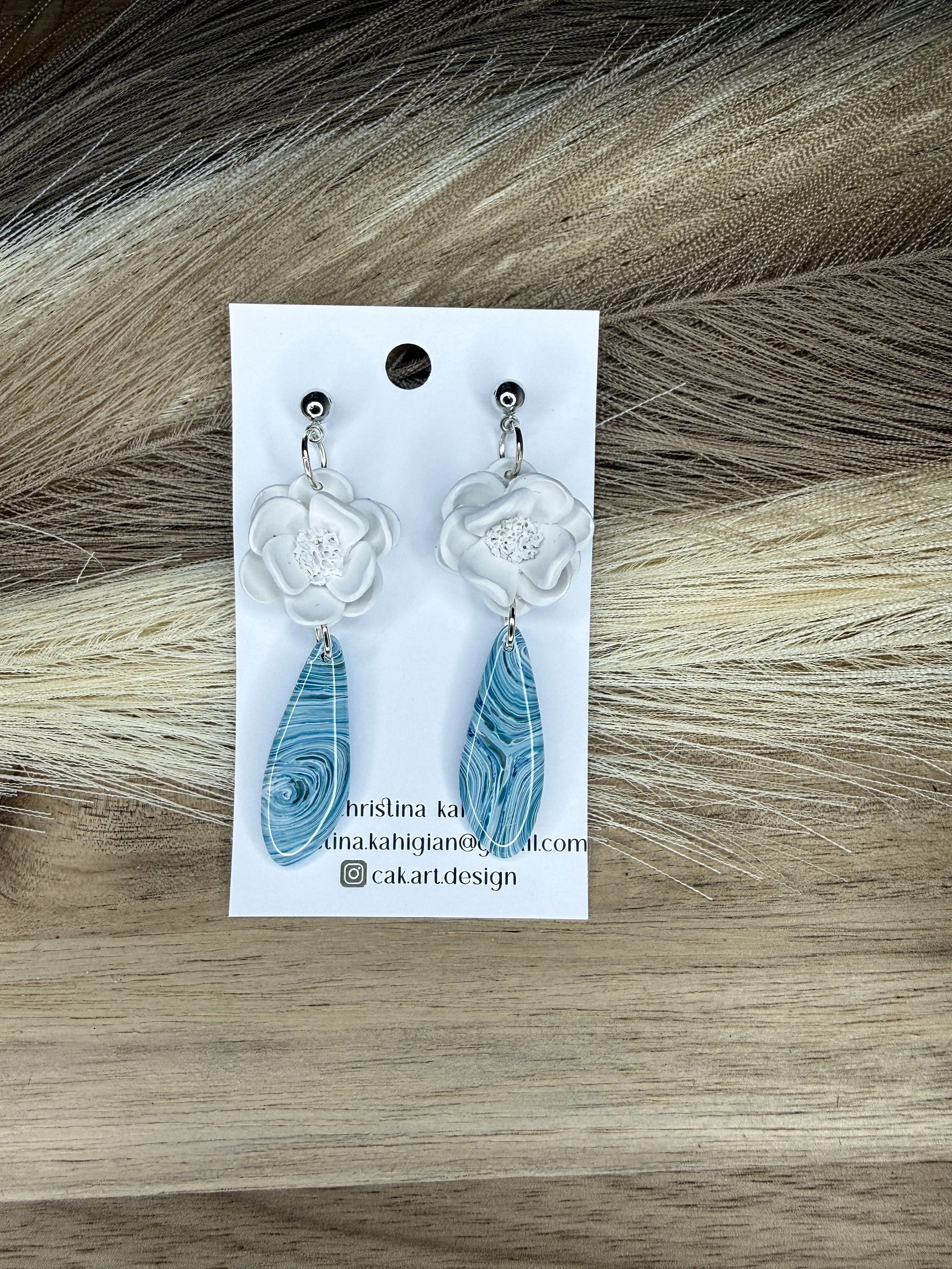 grey with blue, white and green marble florals