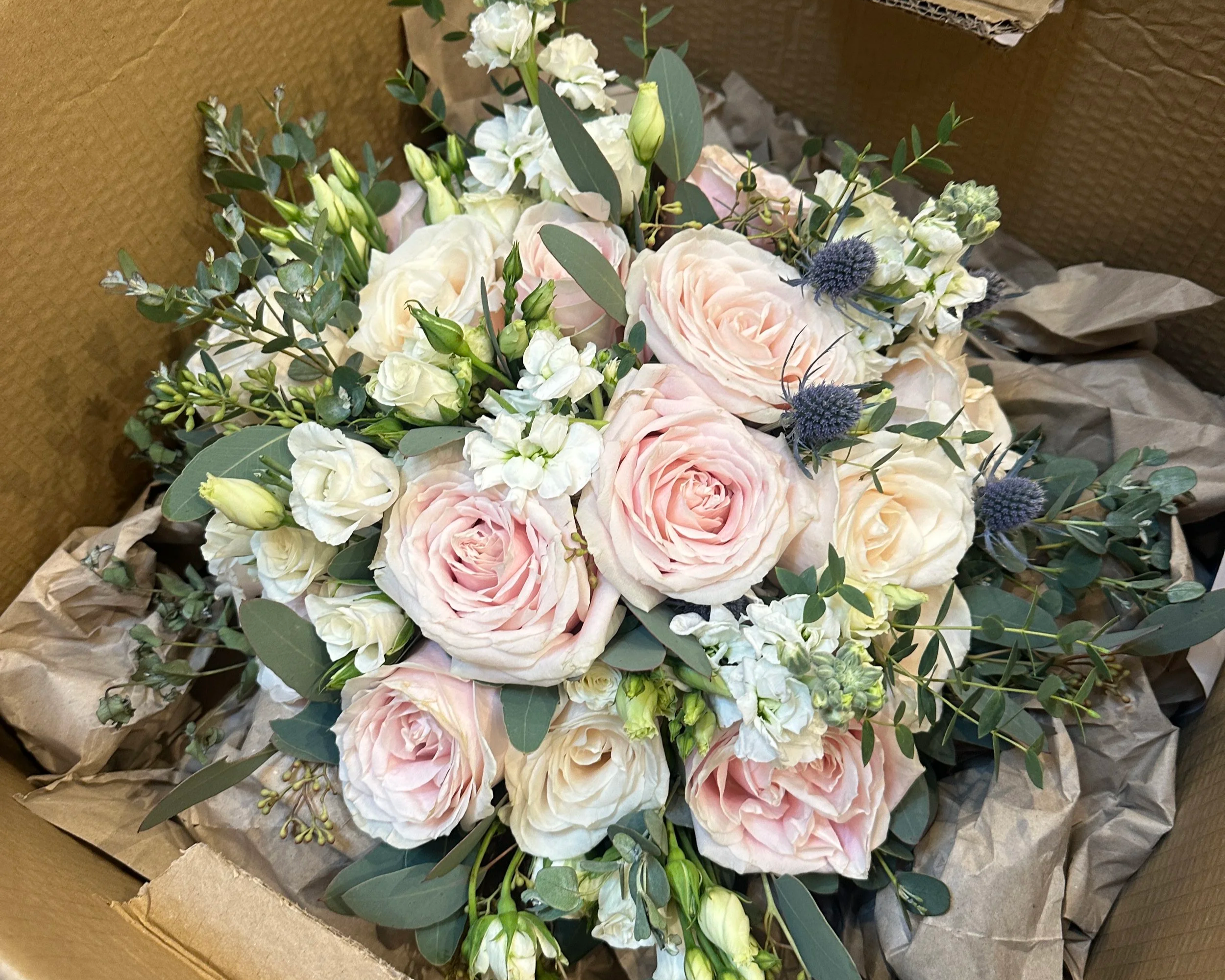 How do I package my wedding flowers for postage?