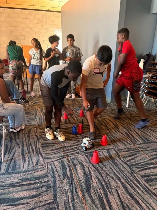 students controlling their lego robot