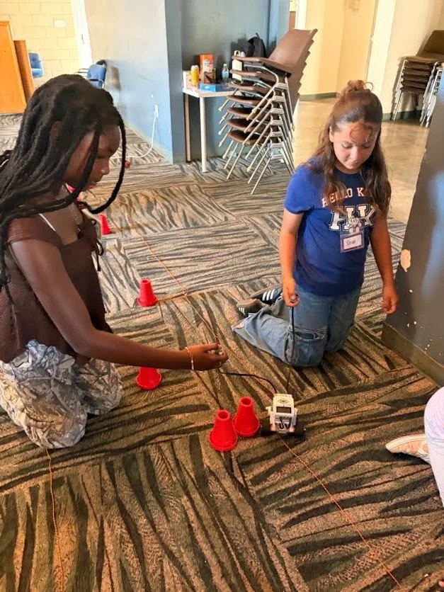 students controling their lego robot