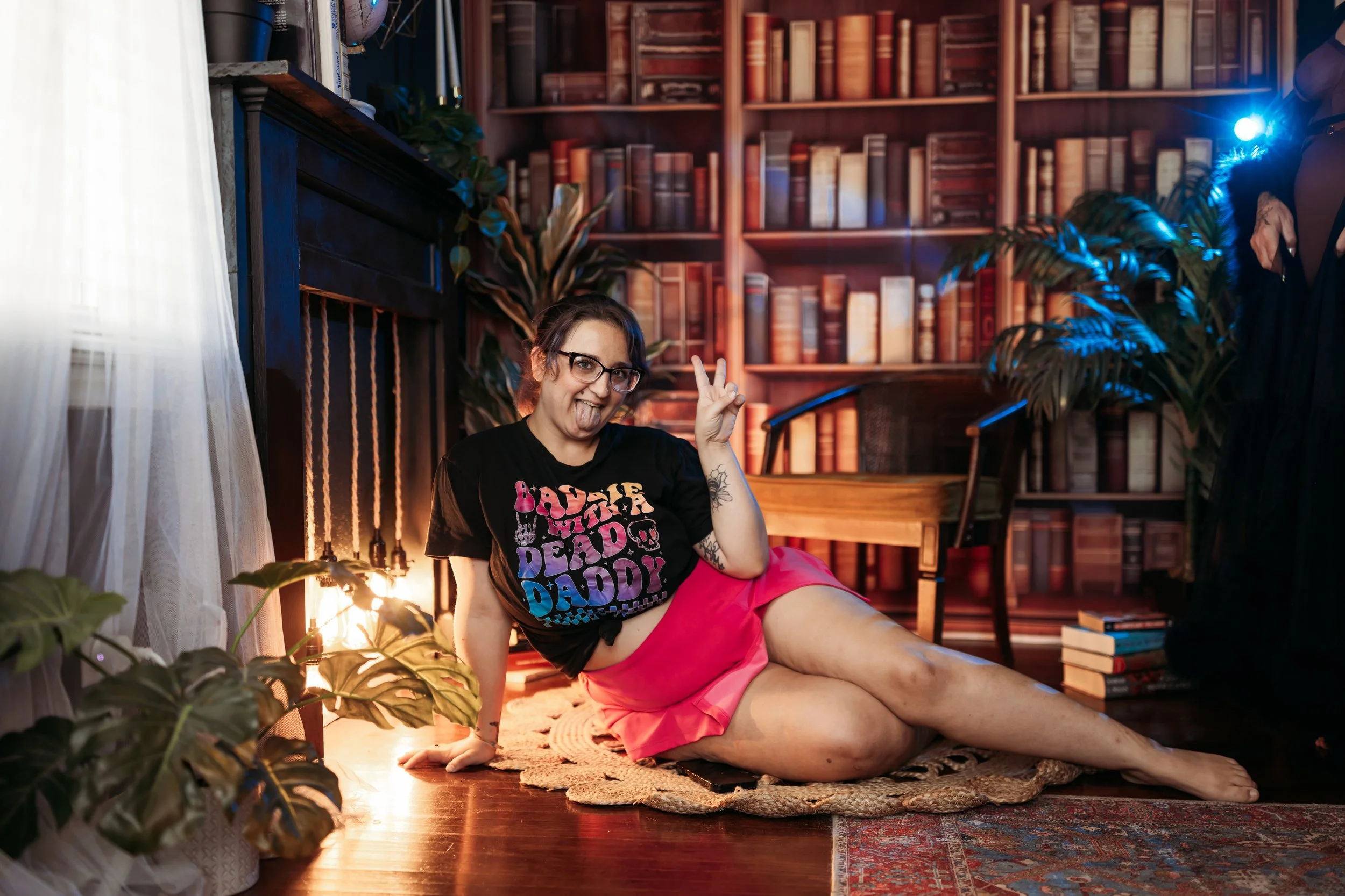 outfit-graphic-tee-jacksonville.jpgClient wearing a graphic T-shirt and pink skirt for a non-lingerie boudoir look at Hype Girl Boudoir